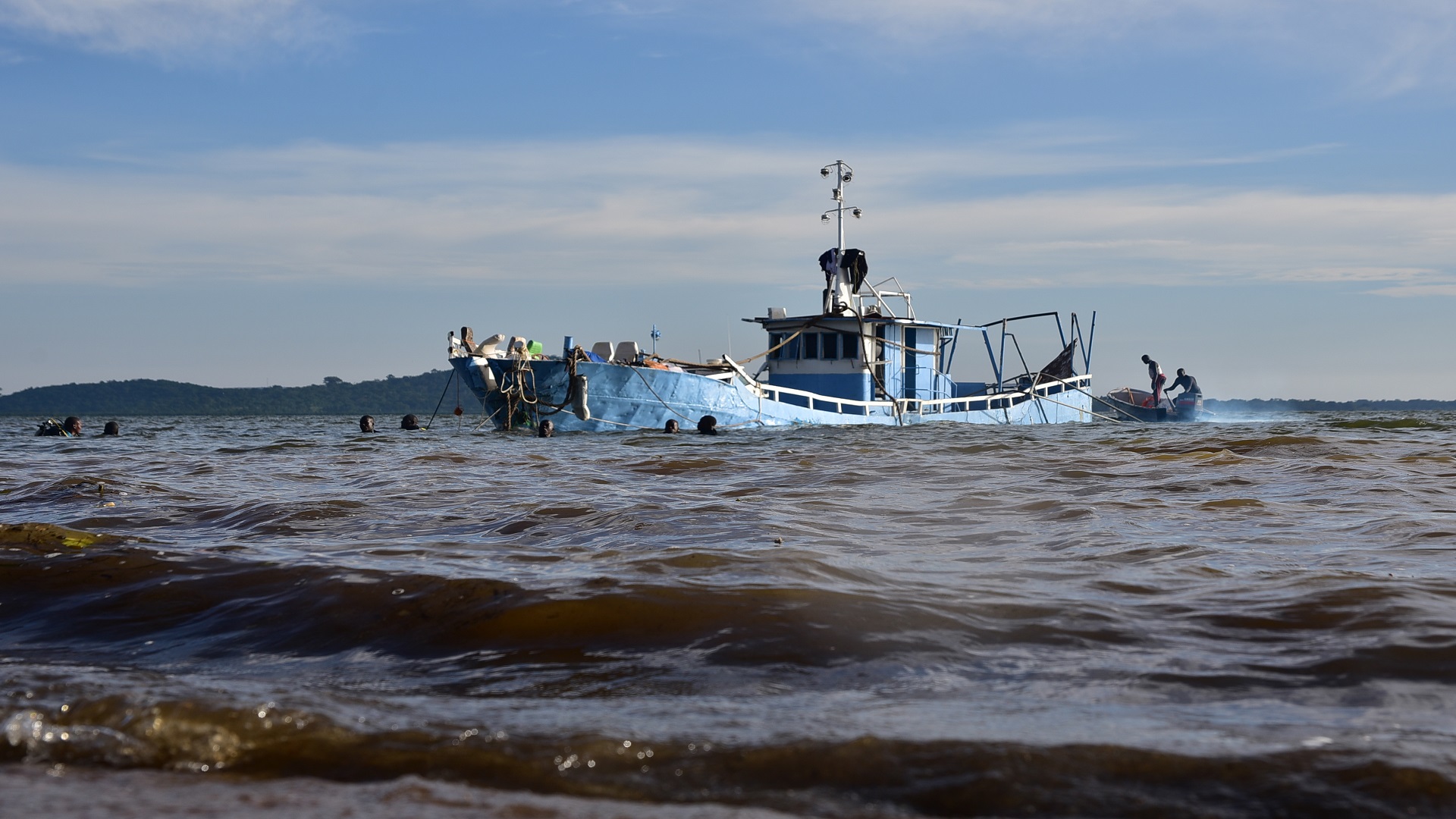 Image for the title: Boat capsizes in Lake Albert, killing 26: Ugandan official 