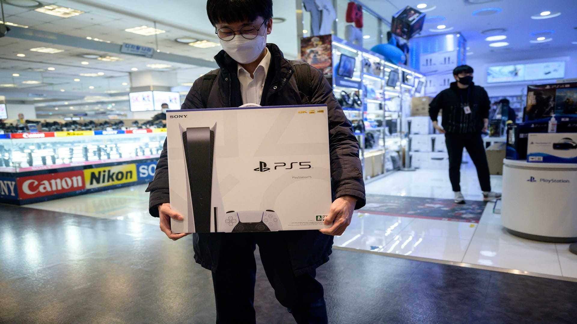 Image for the title: Sony PS5 sold out online as pandemic chills real-world retailing 