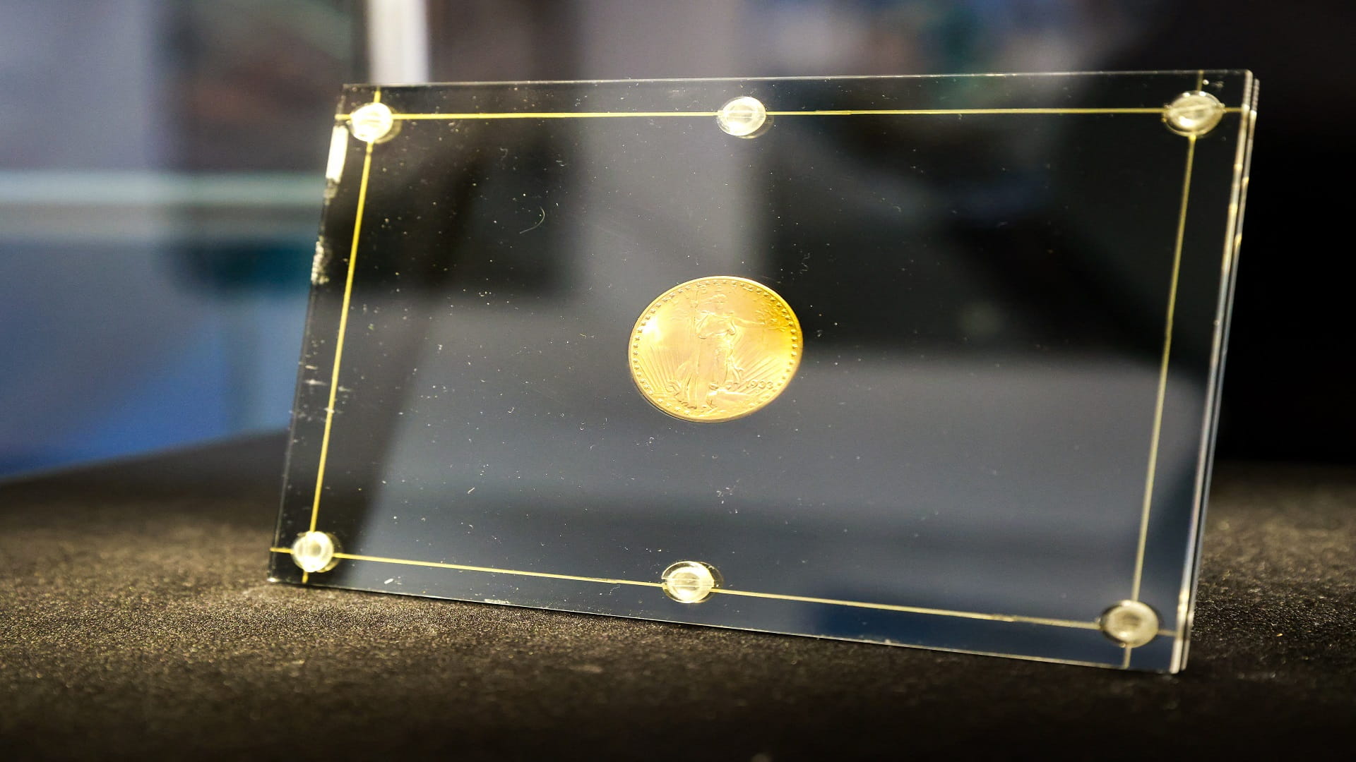 Image for the title: Swiss strike gold with world's smallest commemorative coin 