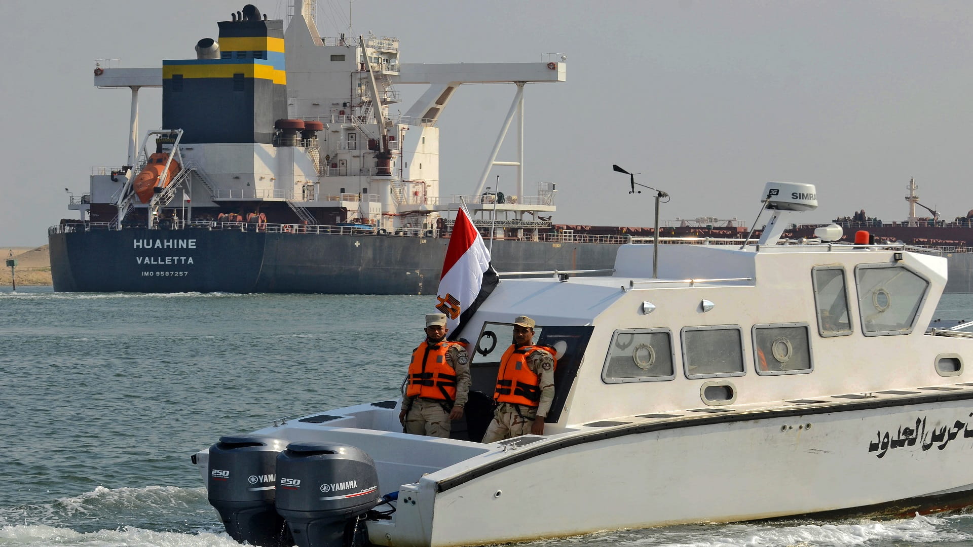 Image for the title: Suez Canal shipping backlog to end on Saturday 
