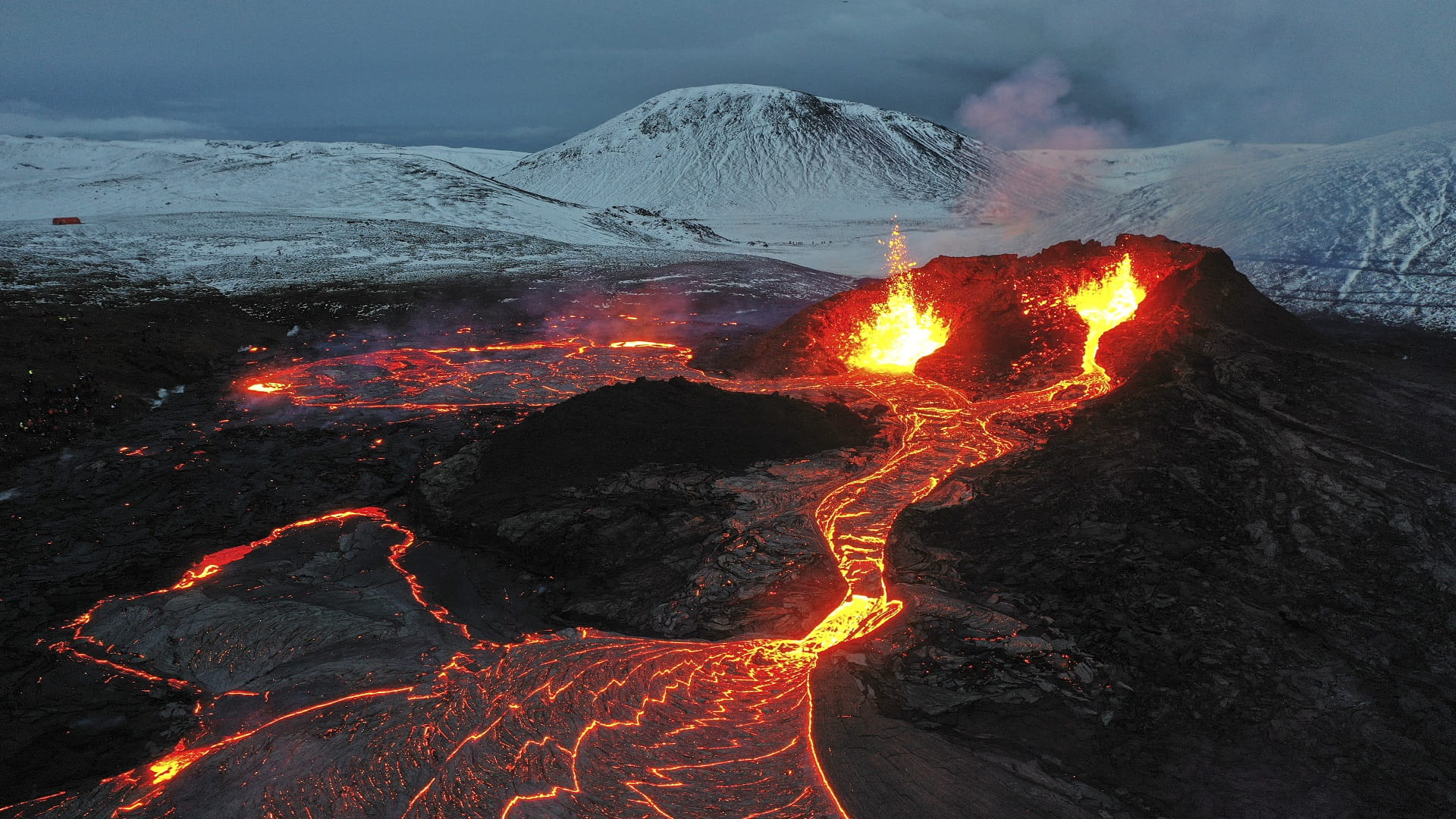 Image for the title: New lava stream flows from Iceland volcano 