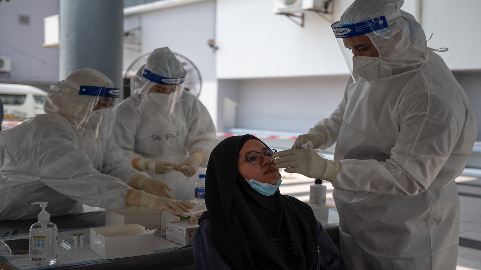 Image for the title: Malaysia starts COVID19 vaccination early as first doses arrive 