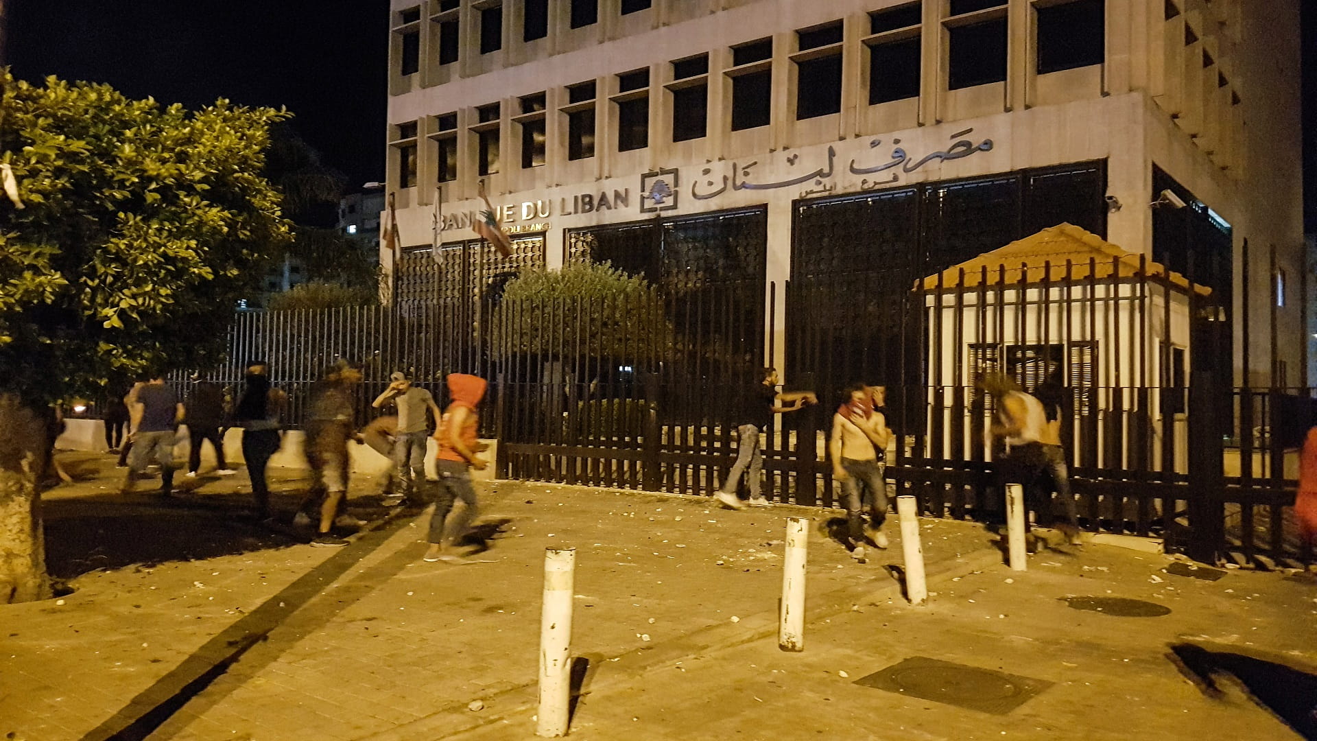 Image for the title: Lebanon's central bank to review decision on bank withdrawals 