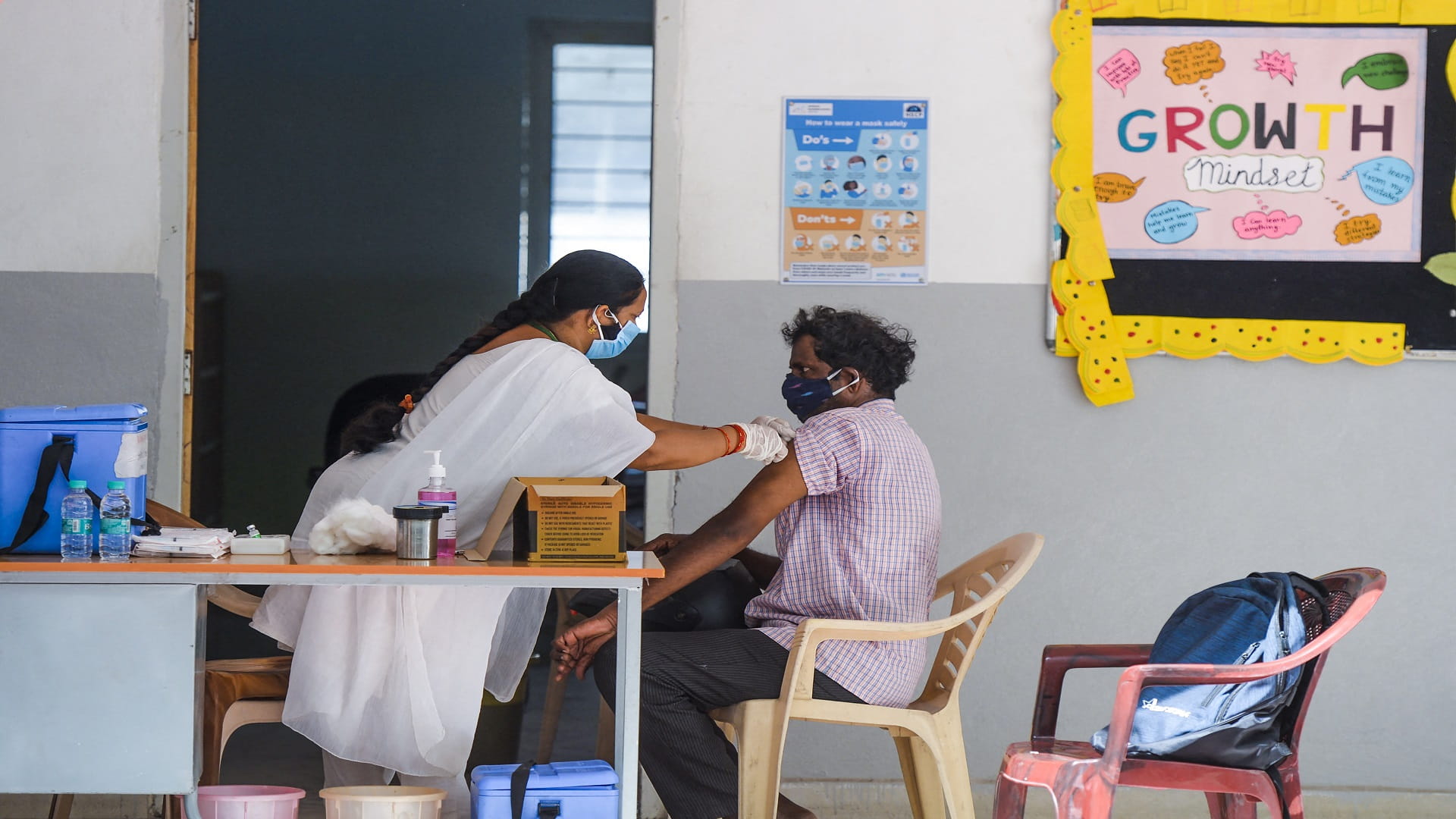 Image for the title: India posts daily rise of 132,364 new COVID-19 cases 