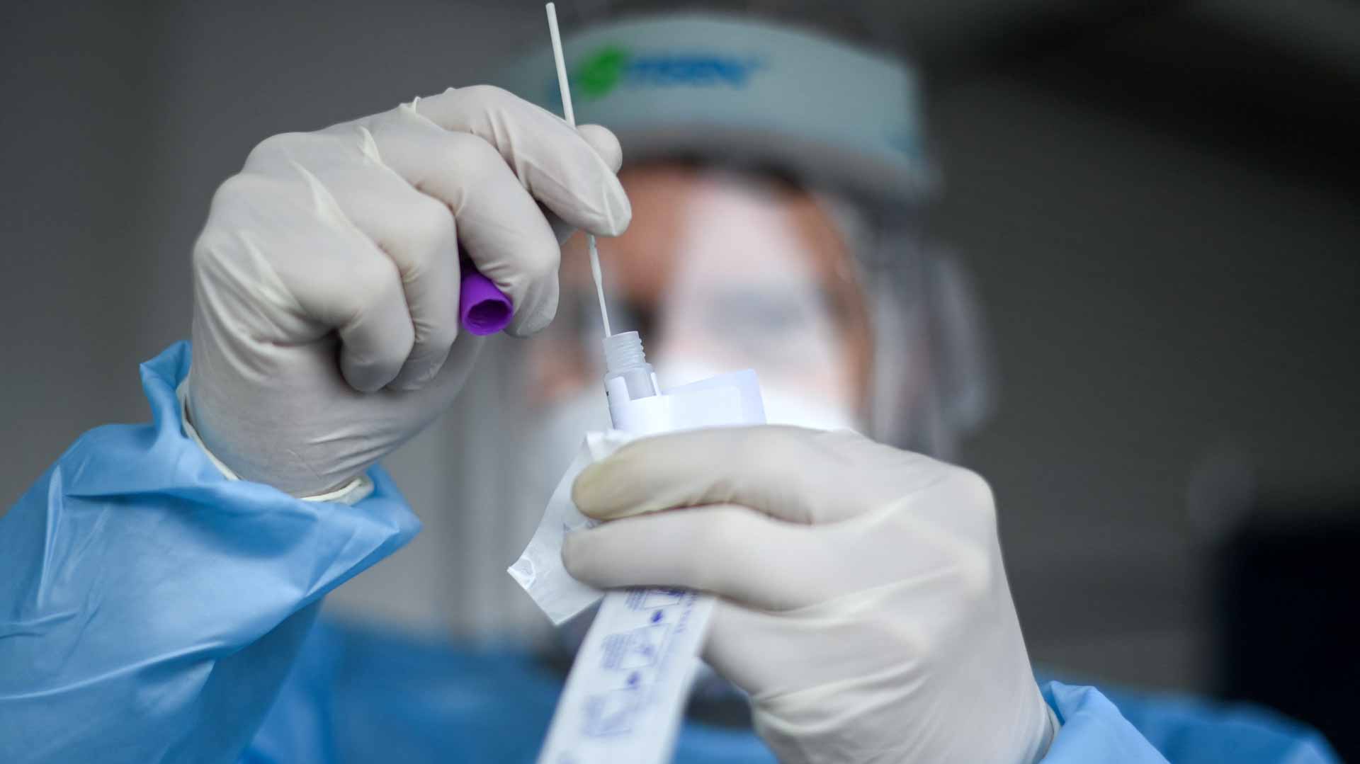 Image for the title: Global COVID-19 death toll exceeds 4 mn 