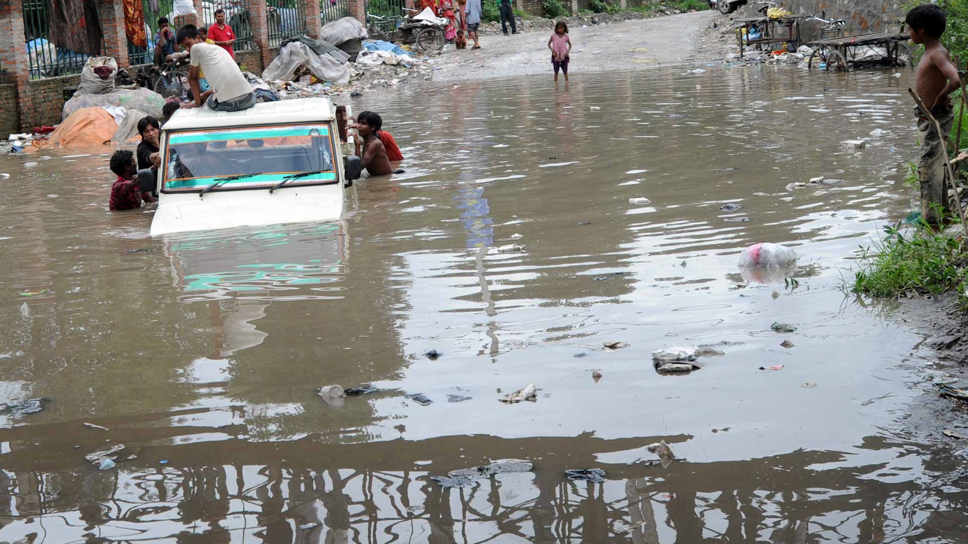 Image for the title: Chinese,Indian workers among 11 killed in Nepal floods,25 missing 