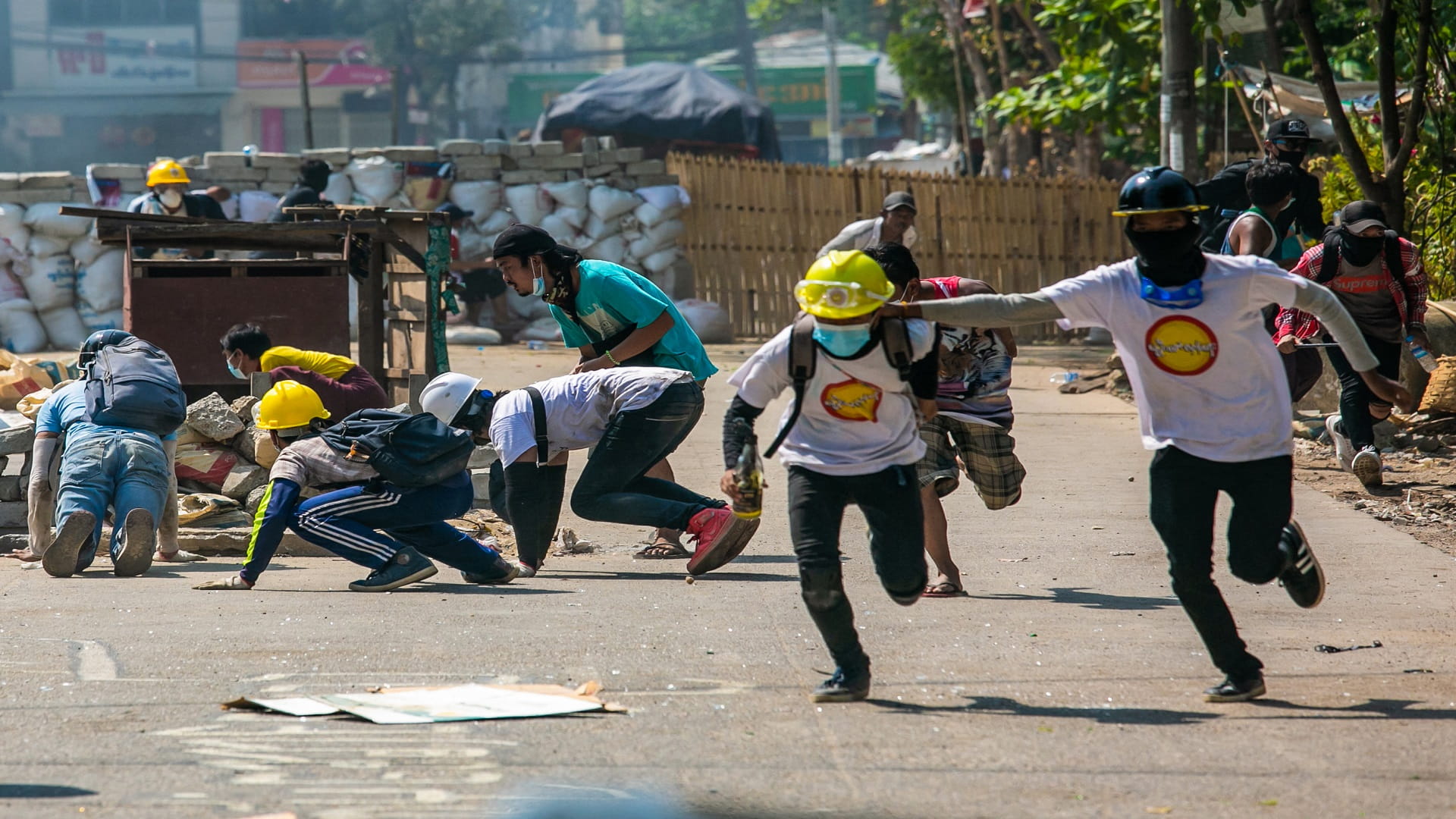 Image for the title: Myanmar protesters voice defiance under cover of the night 
