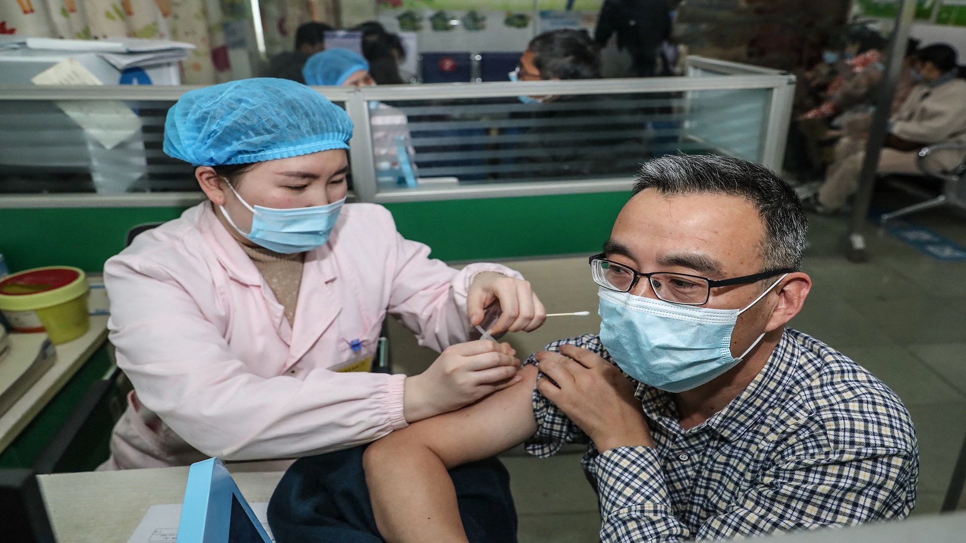 Image for the title: China reports 9 new COVID-19 cases vs 7 a day earlier 