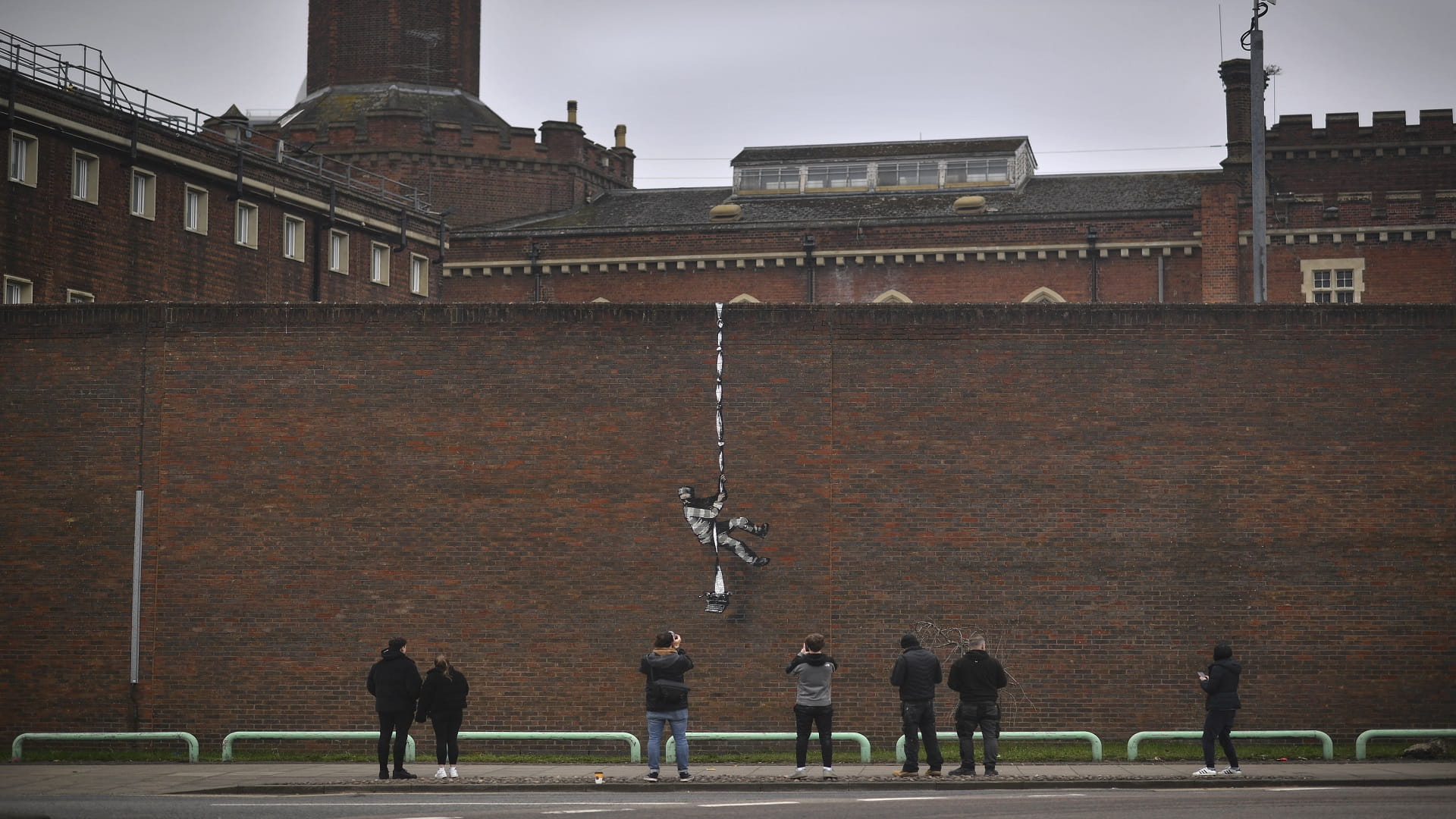 Image for the title: Banksy takes credit for work at Oscar Wilde jail 