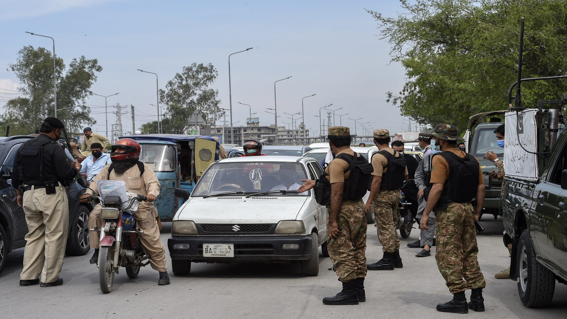 Image for the title: Pakistan imposes Eid holiday shutdown as virus cases soar 