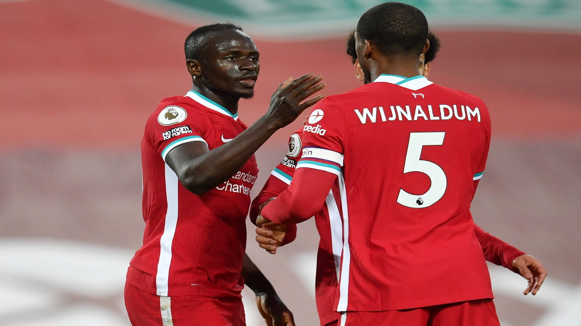 Image for the title: Mane seals win for Liverpool to keep top-four hopes alive 