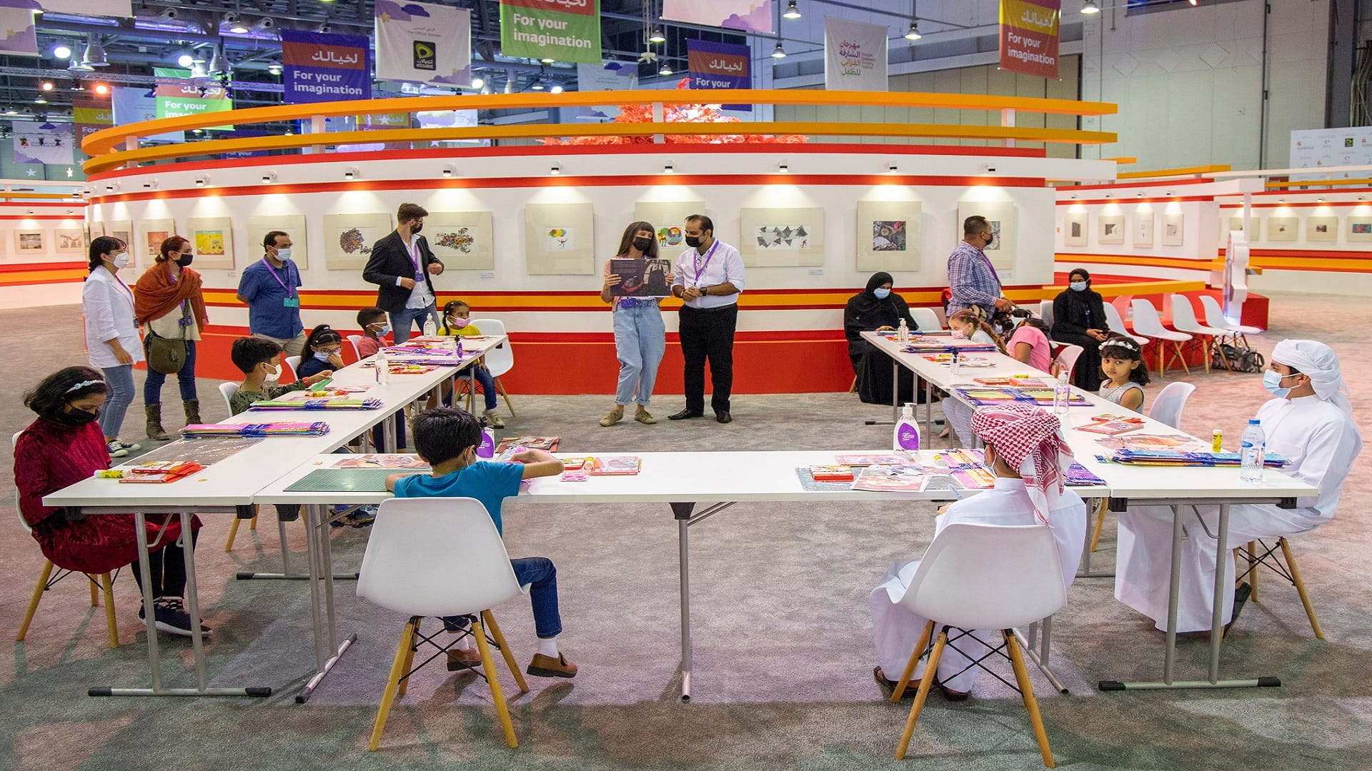 Image for the title: Young artists create 2D collages with Alessia Bravo at 12th SCRF 
