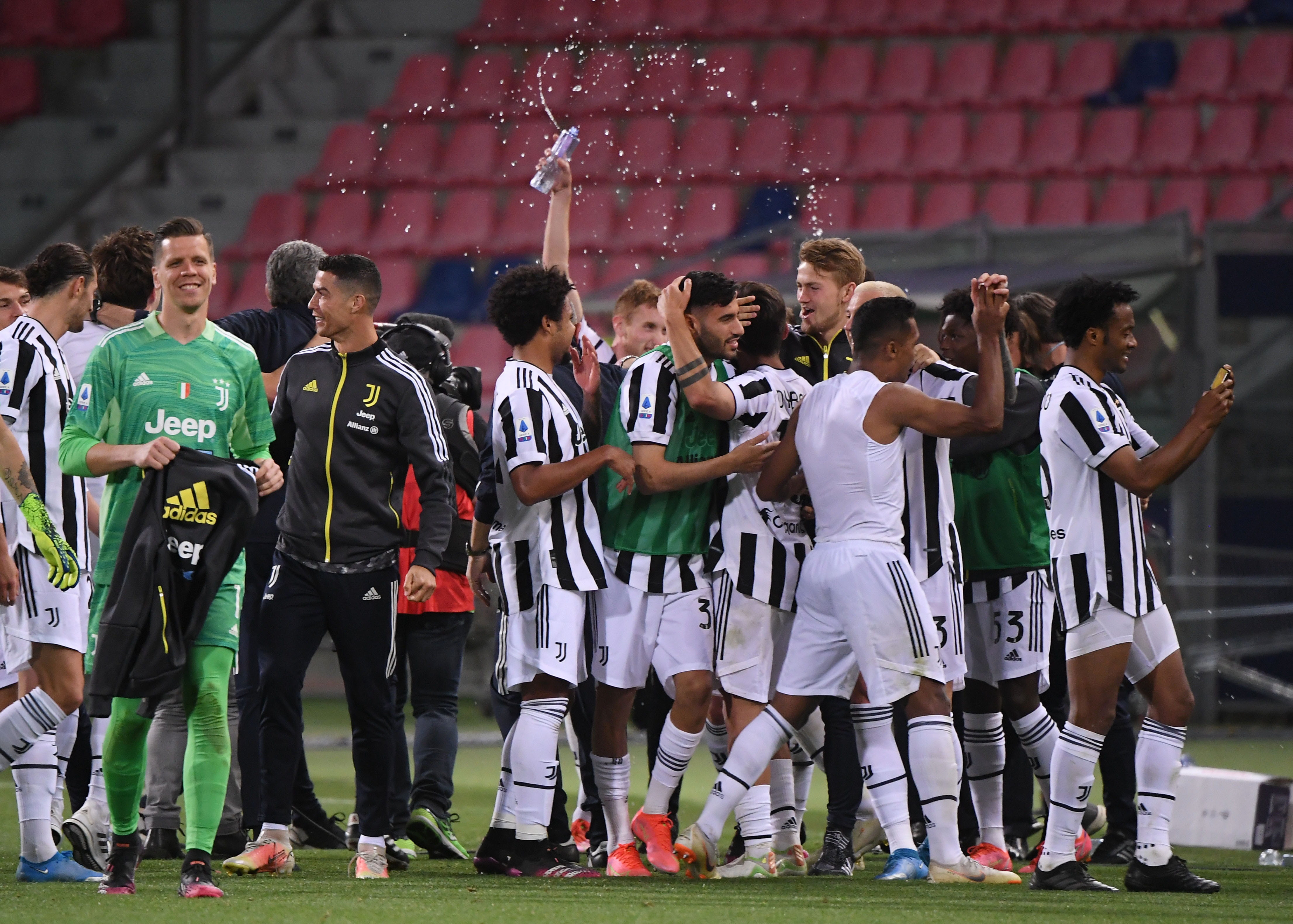 Image for the title: Juve thrash Bologna to seal Champions League spot 