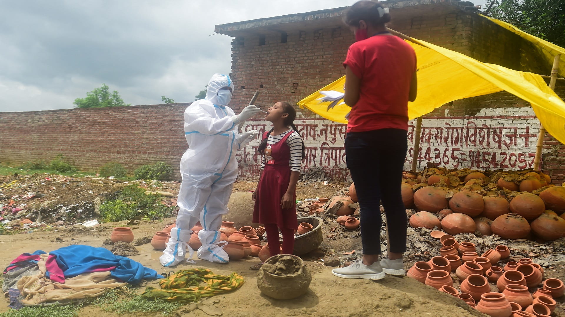 Image for the title: India posts lowest daily rise in COVID-19 cases in over a month 