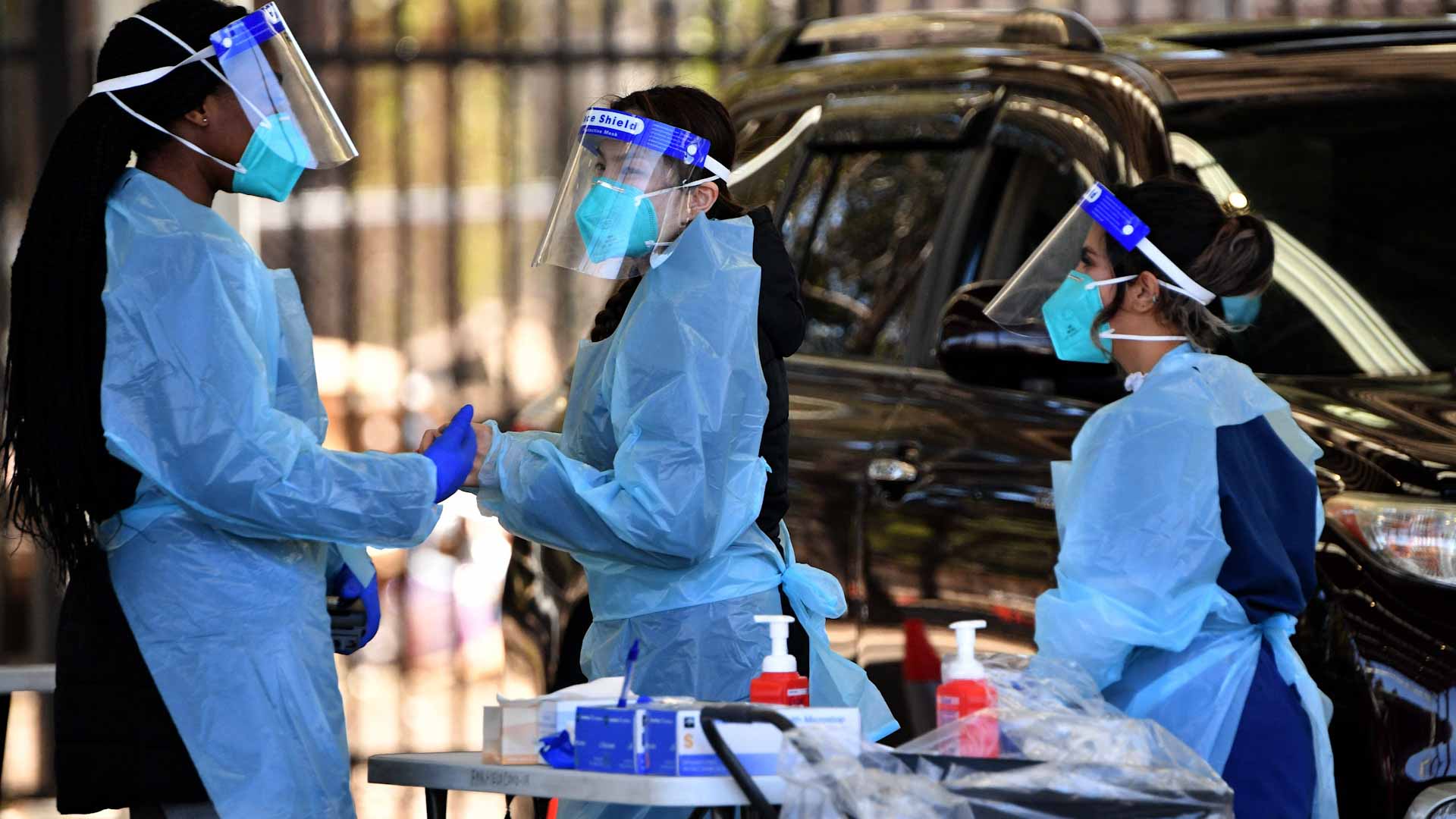 Image for the title: Australia's east coast battles rising COVID-19 cases 