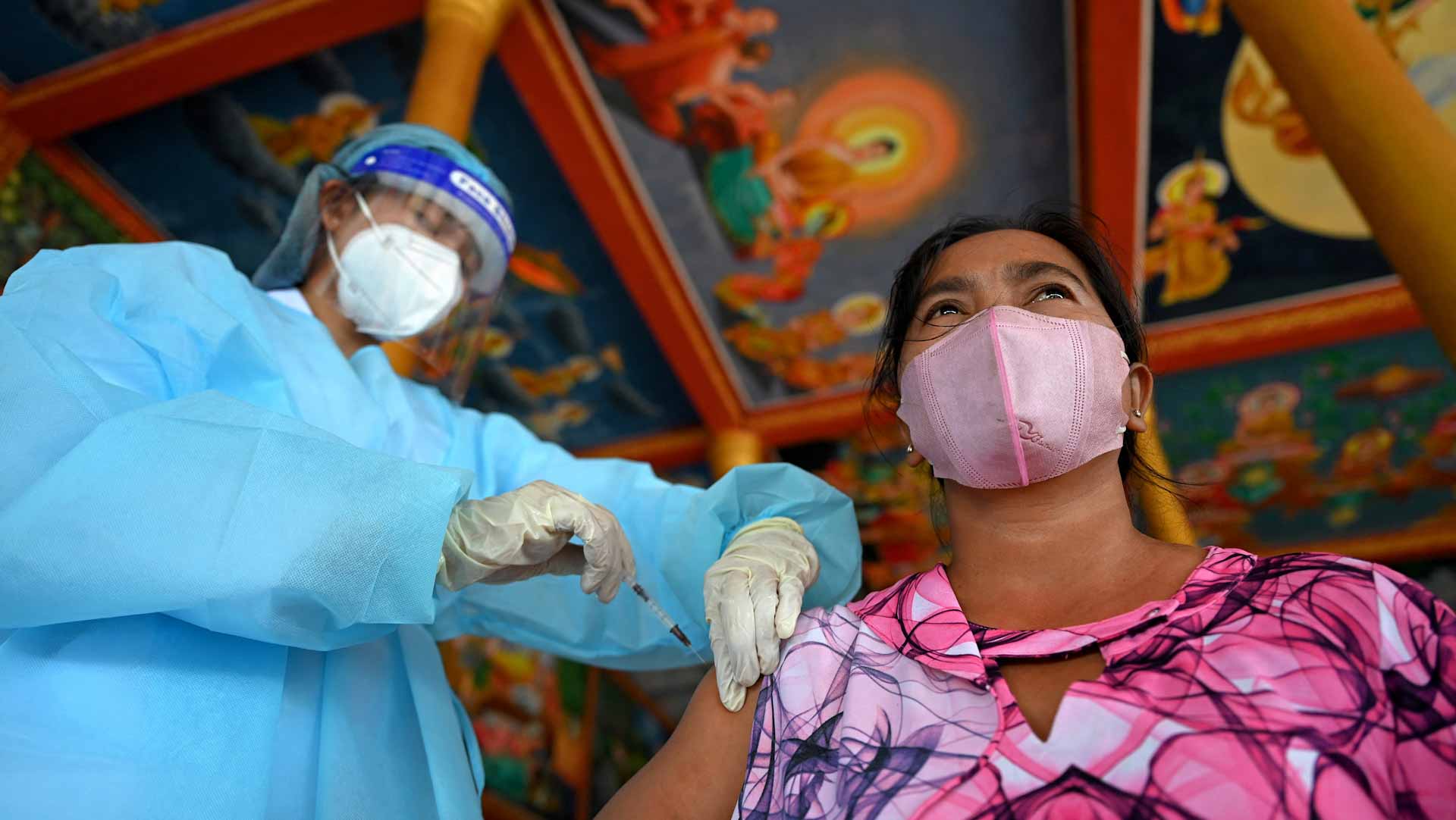 Image for the title: Cambodia begins Covid-19 vaccinations for teenagers 