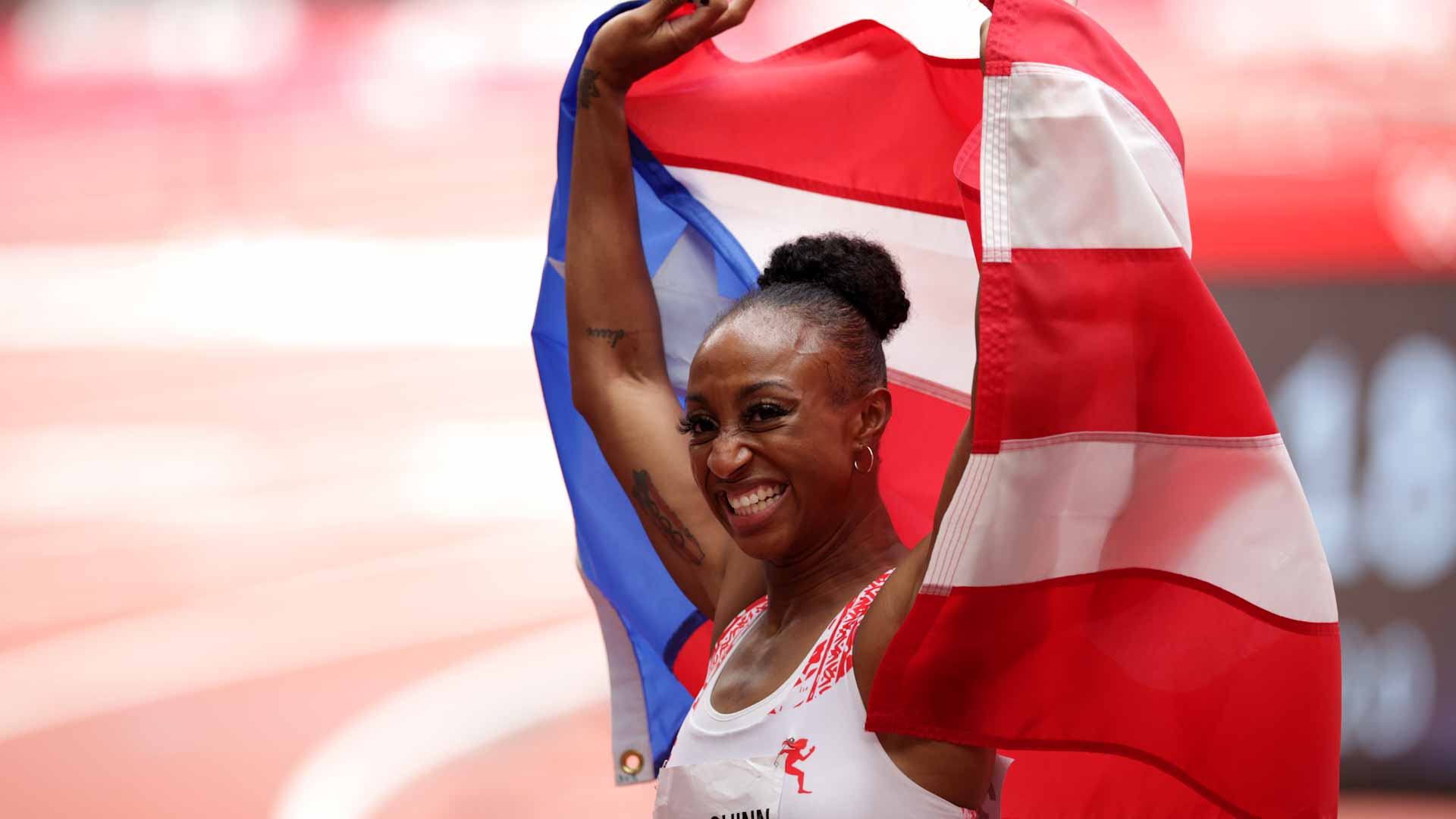 Image for the title: Puerto Rico's Camacho-Quinn wins gold in women's 100m hurdles 