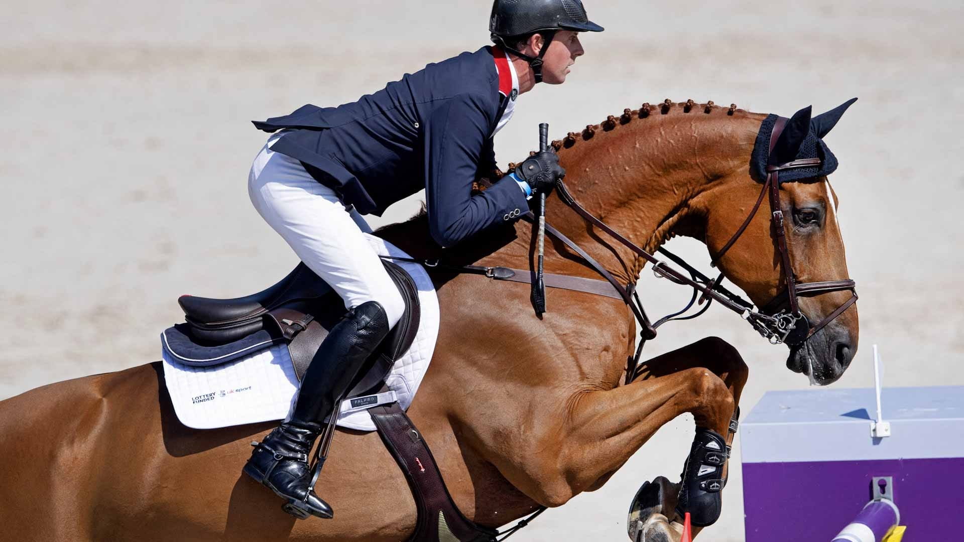 Image for the title: Olympics-Equestrian-Britain's Ben Maher jumps to individual gold 