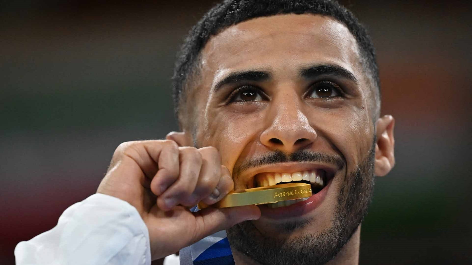 Image for the title: Britain's Yafai wins flyweight boxing gold, Ukrainian KO'd 