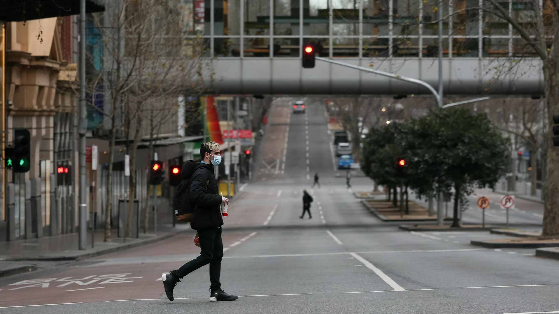 Image for the title: Australia's east coast continues to struggle with Delta outbreaks 