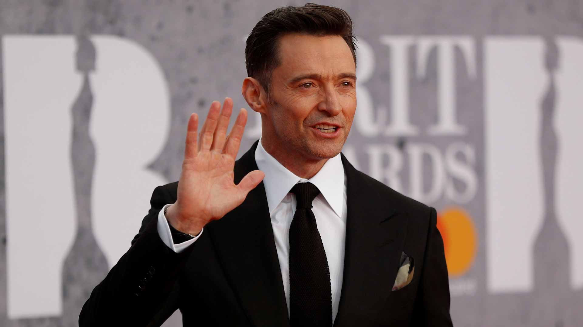 Image for the title: Hugh Jackman chases memories in submerged Miami in 'Reminiscence' 