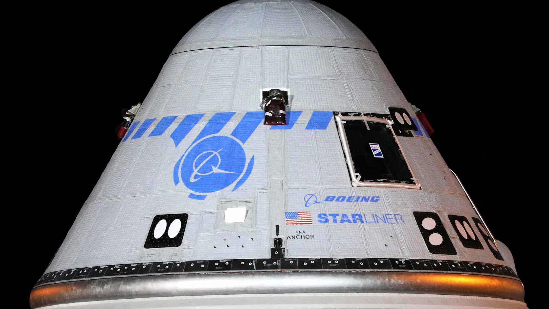 Image for the title: Boeing removes Starliner from rocket, months-long delay expected 