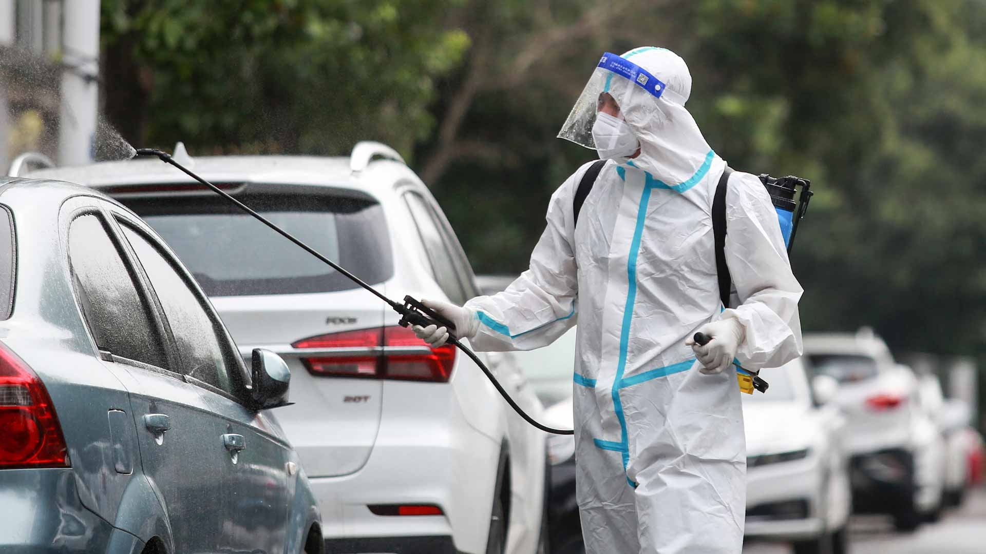 Image for the title: China's retail sales falter as virus rebounds 