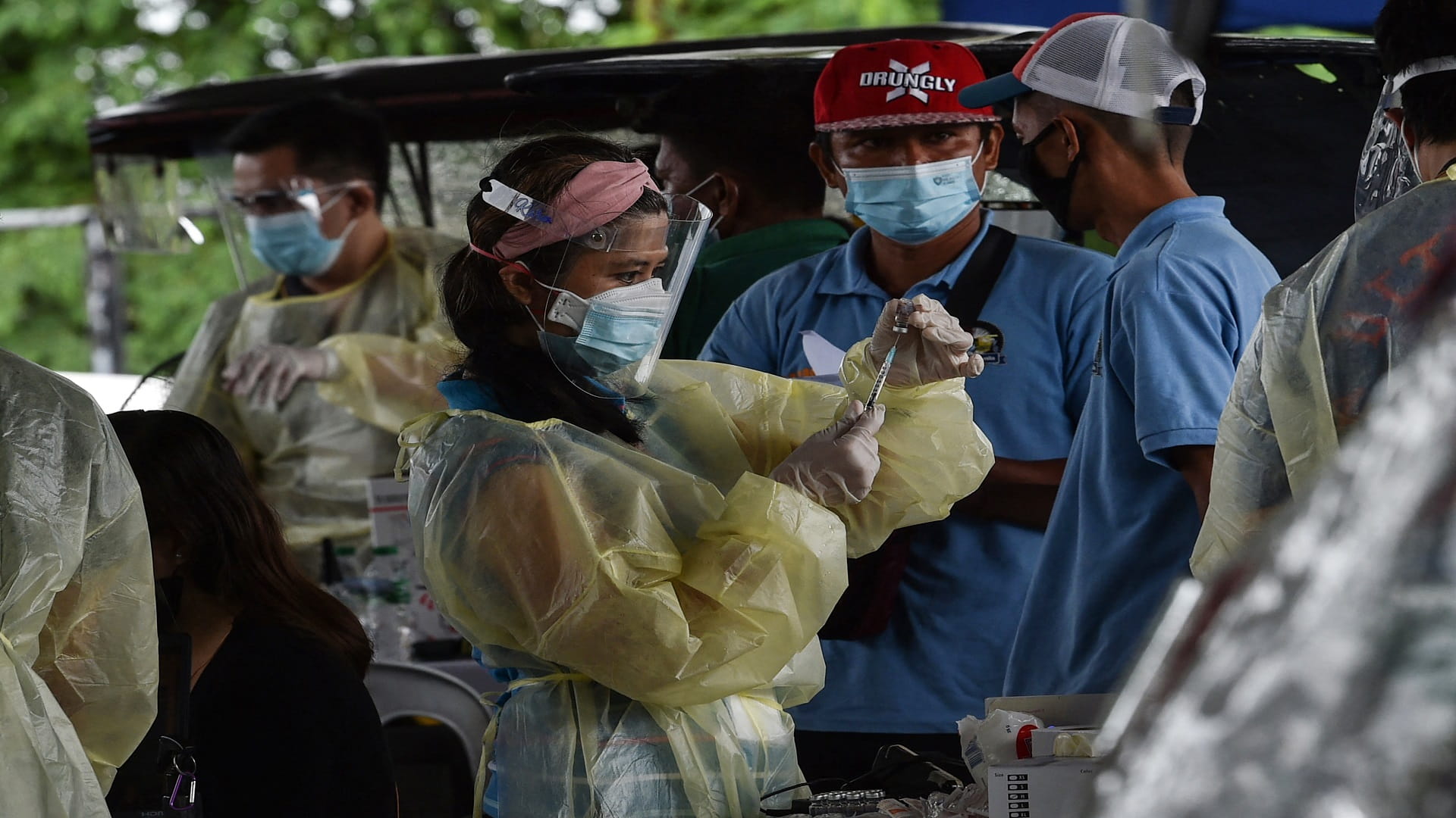 Image for the title: Philippines logs record Coronavirus infections, death rate climbs 