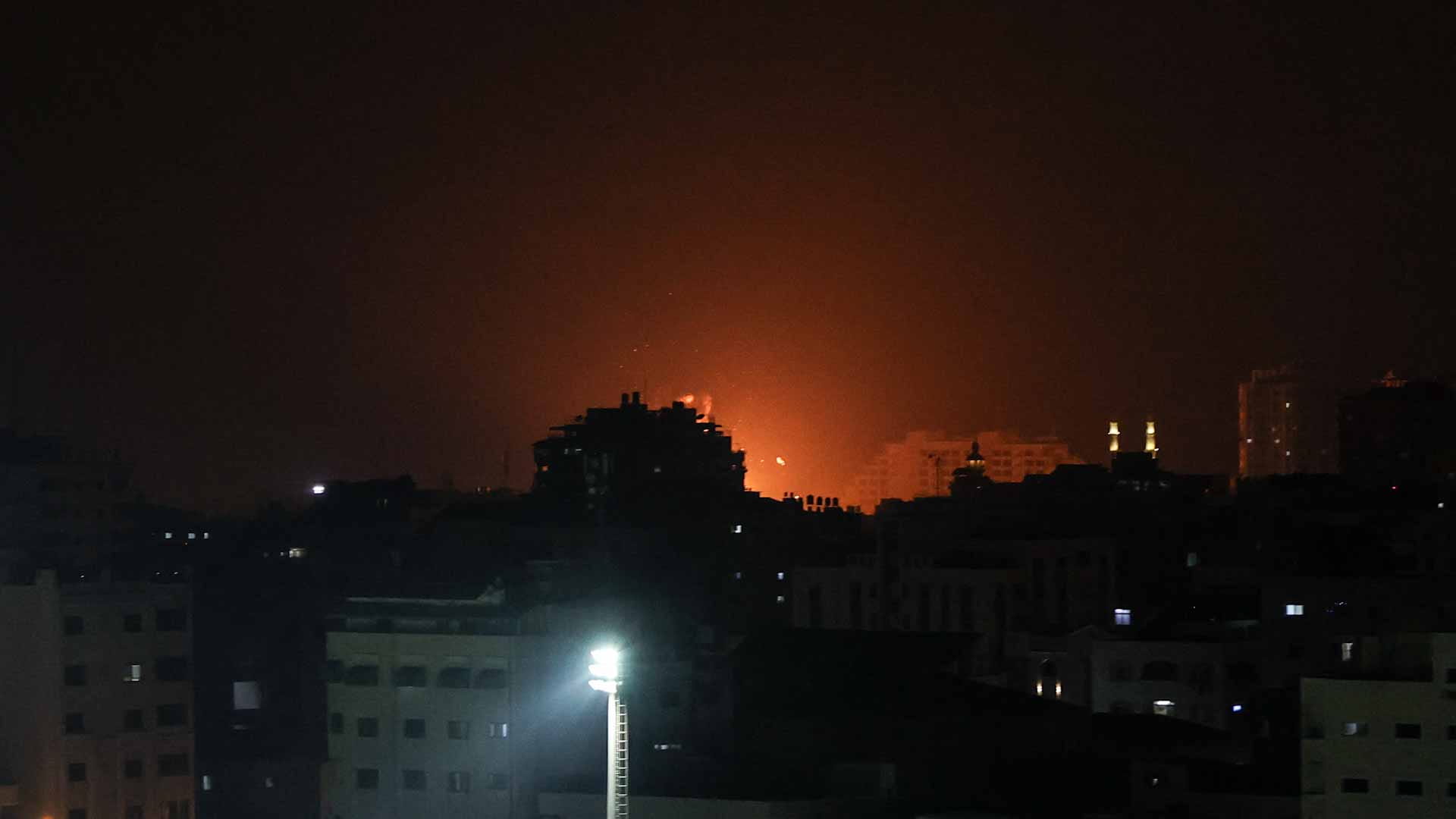 Image for the title: Israeli aircraft strike Gaza after border clashes 