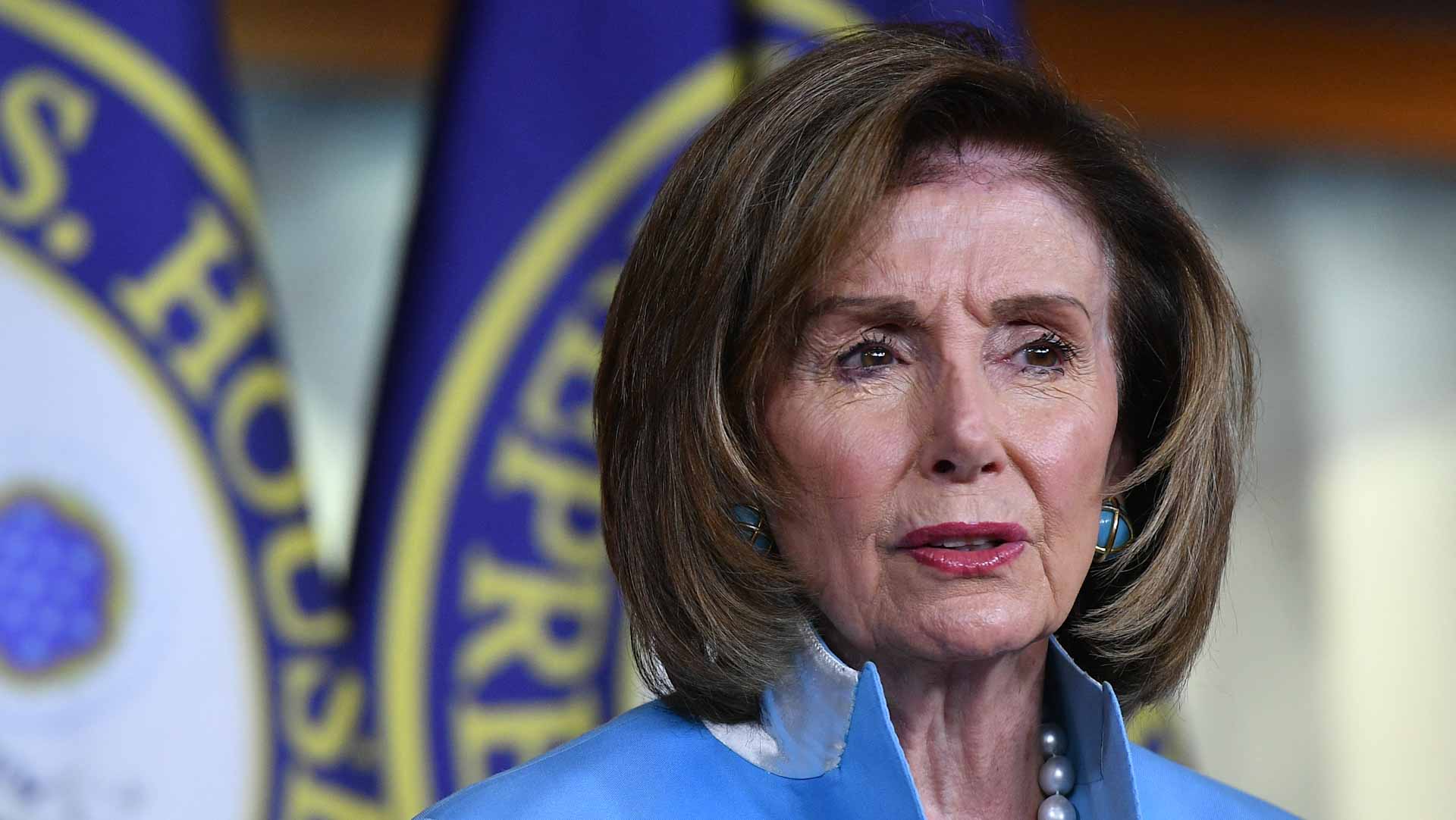 Image for the title: Pelosi sets Oct 1 target for infrastructure, Biden spending bill 