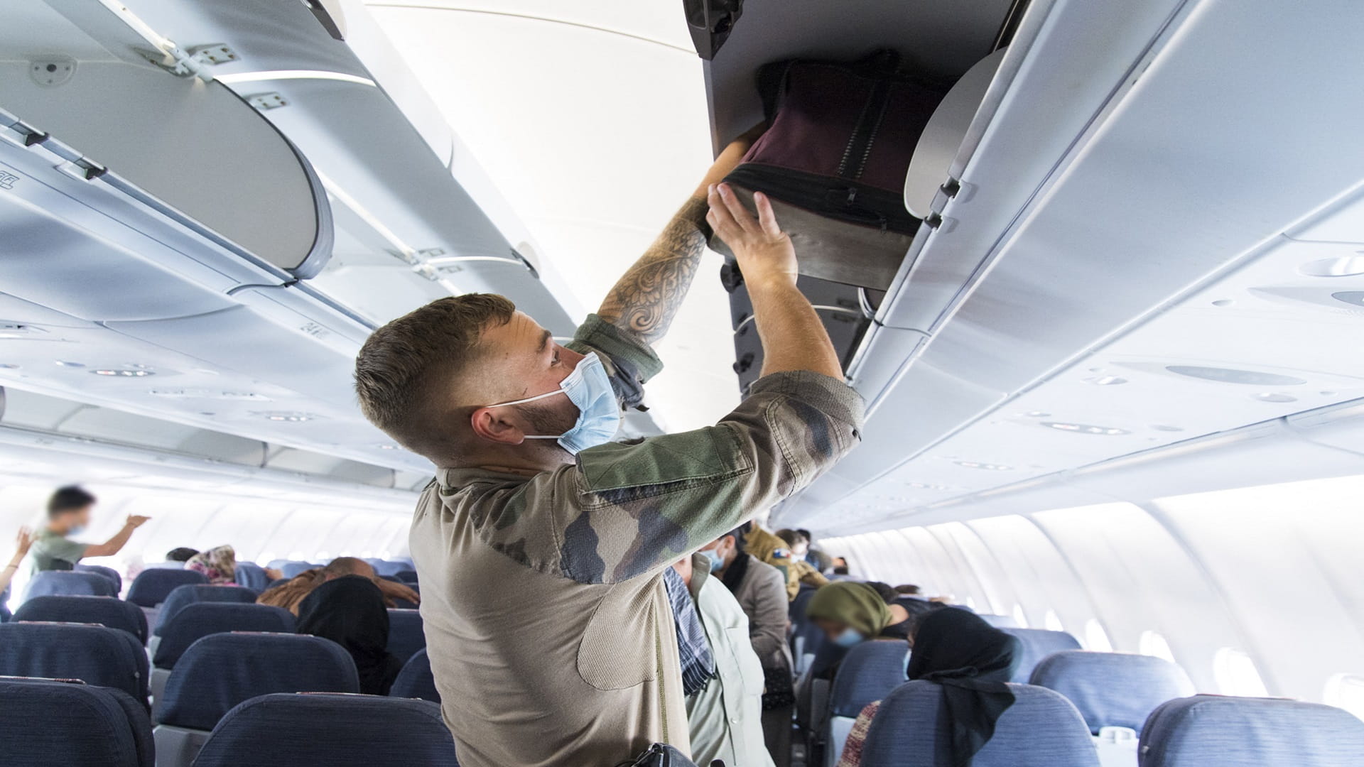 Image for the title: France sees need for Afghan evacuations beyond US deadline 