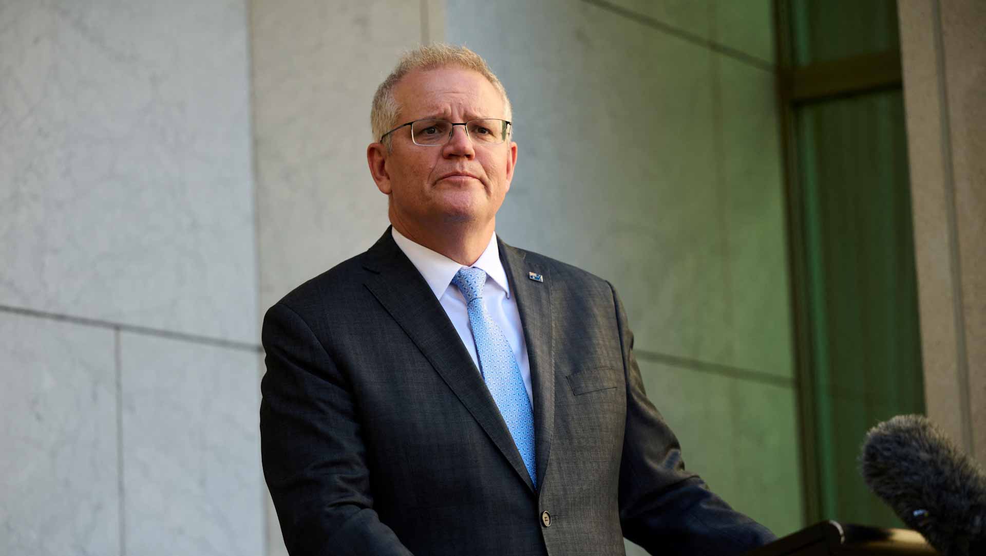 Image for the title: Australia PM backs reopening, says lockdowns unsustainable 