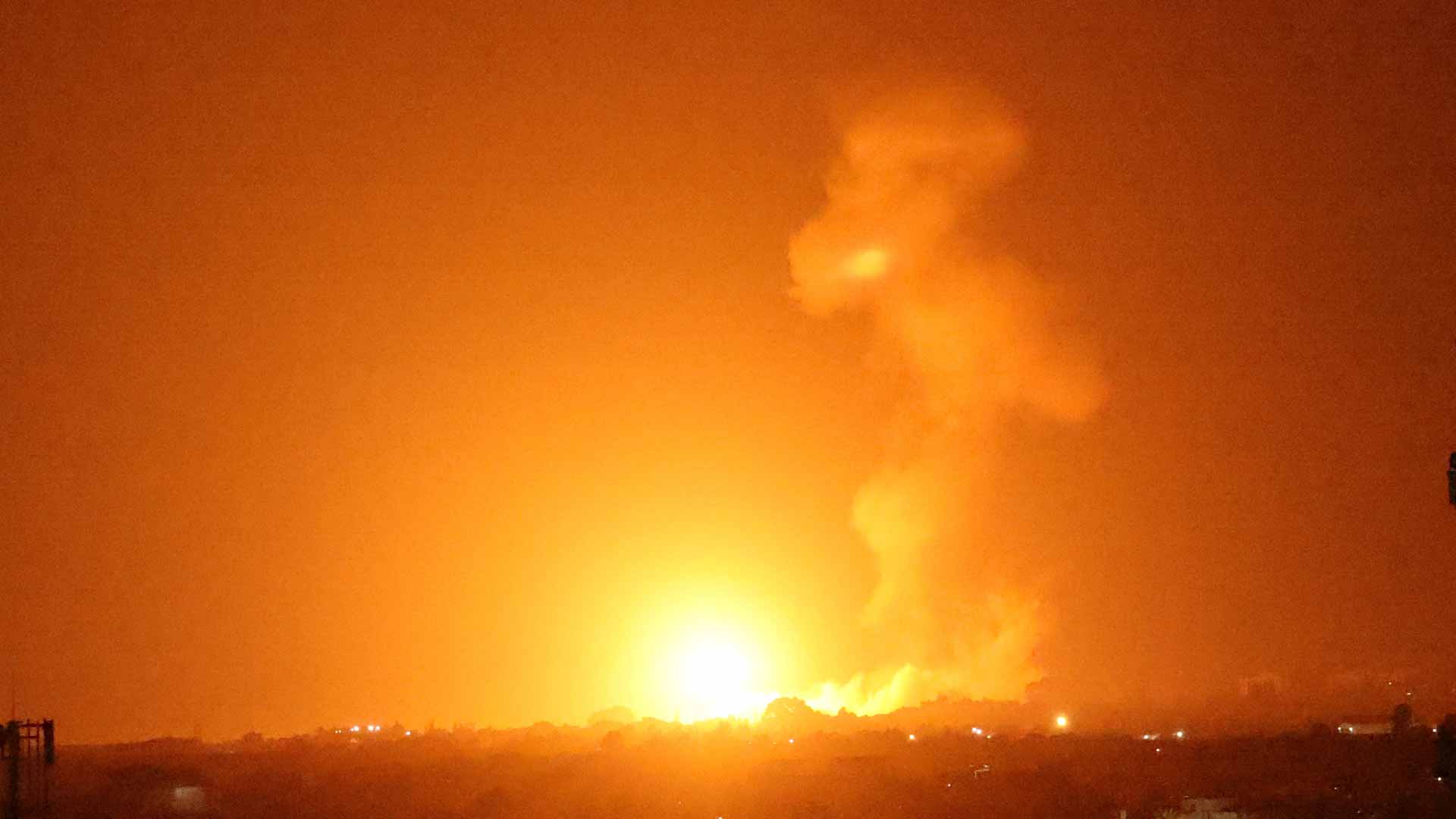 Image for the title: Israel bombs sites in Gaza over fire balloons: military 