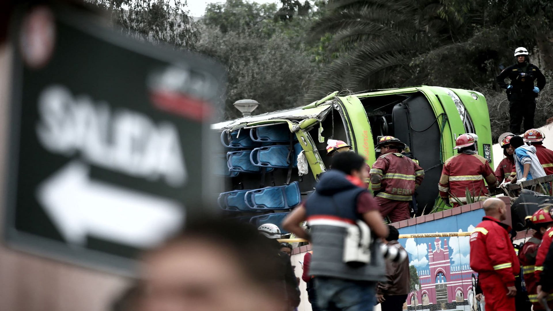 Image for the title: Peruvian bus carrying workers plunges into abyss, killing 16 