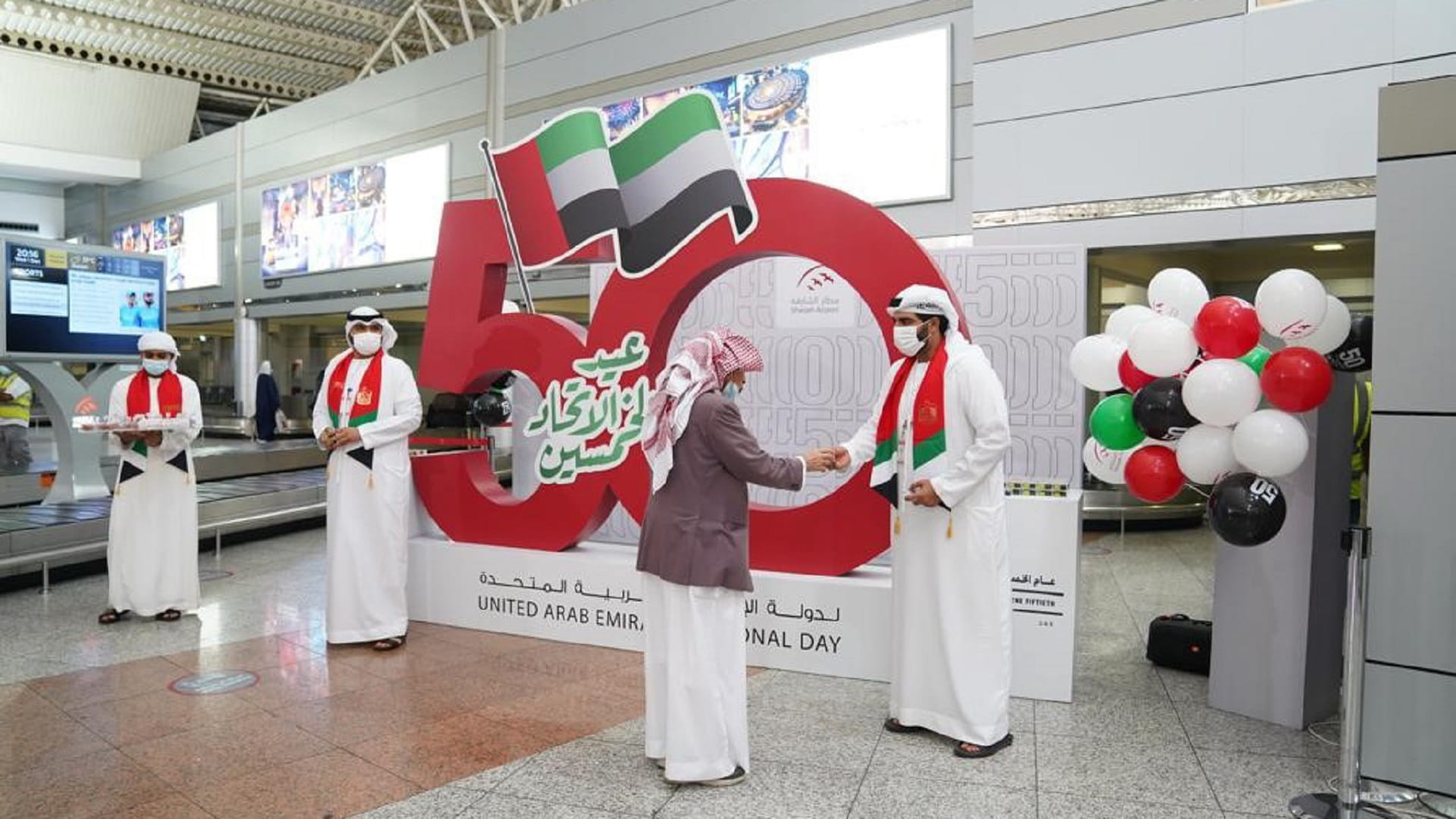 Image for the title: Sharjah Airport celebrates 50th UAE National Day with passengers 