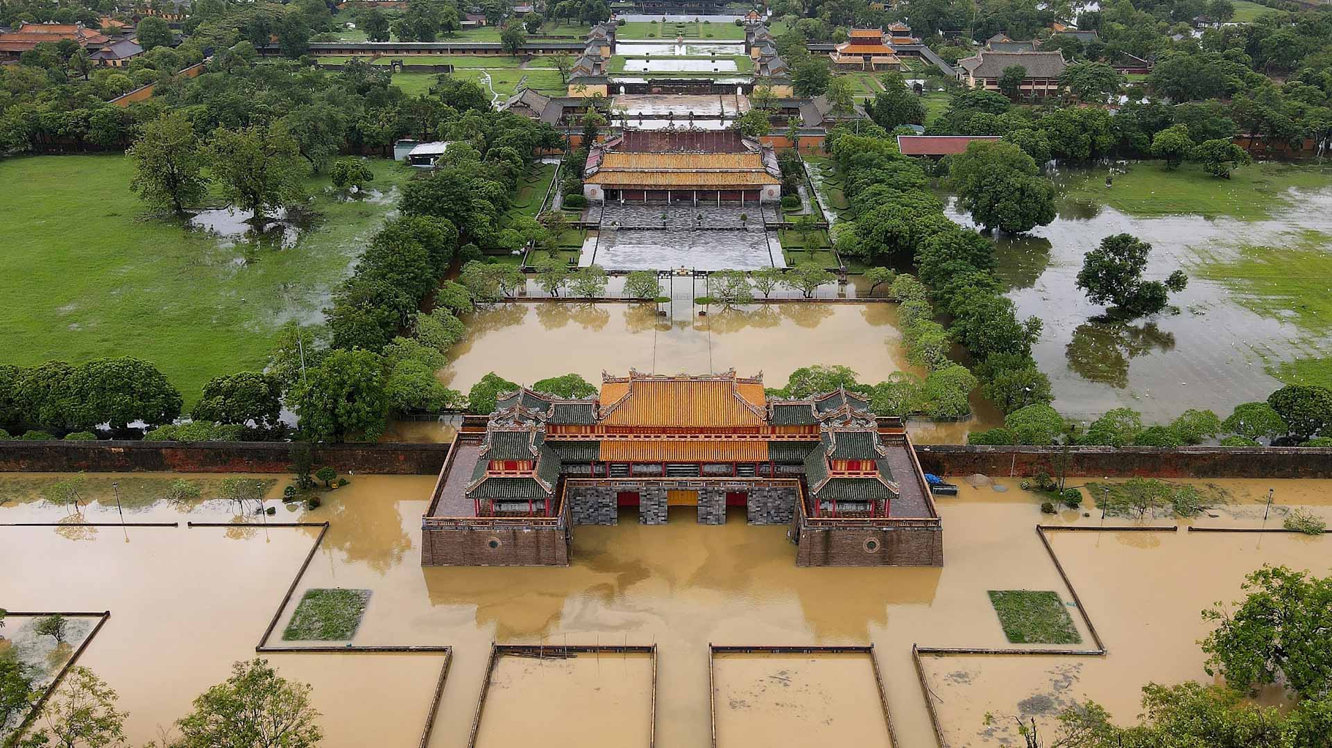 Image for the title: Rains trigger floods and landslides in Vietnam, 18 missing 