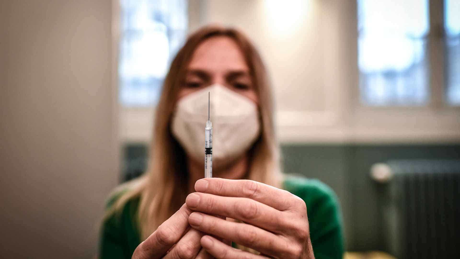 Image for the title: France records more than 50,000 daily Covid cases 