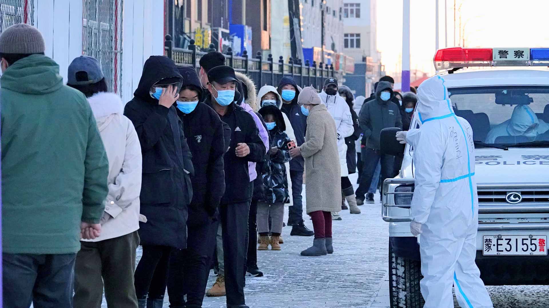 Image for the title: China reports 61 new coronavirus cases 