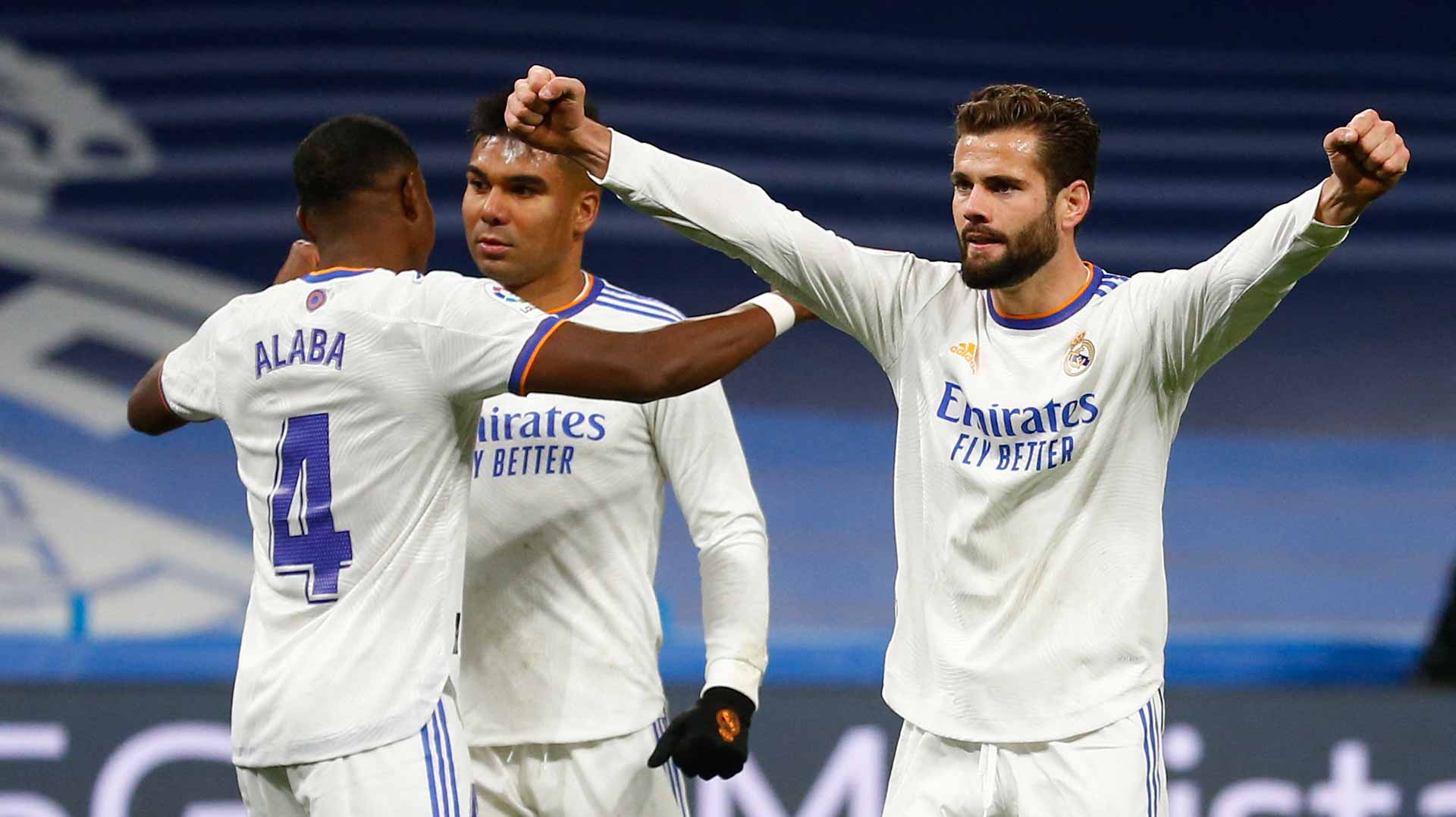 Image for the title: Real Madrid cruise to victory in derby against Atletico 