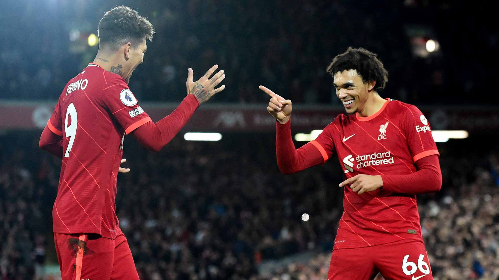 Image for the title: COVID-hit Liverpool bounce back to beat Newcastle 3-1 