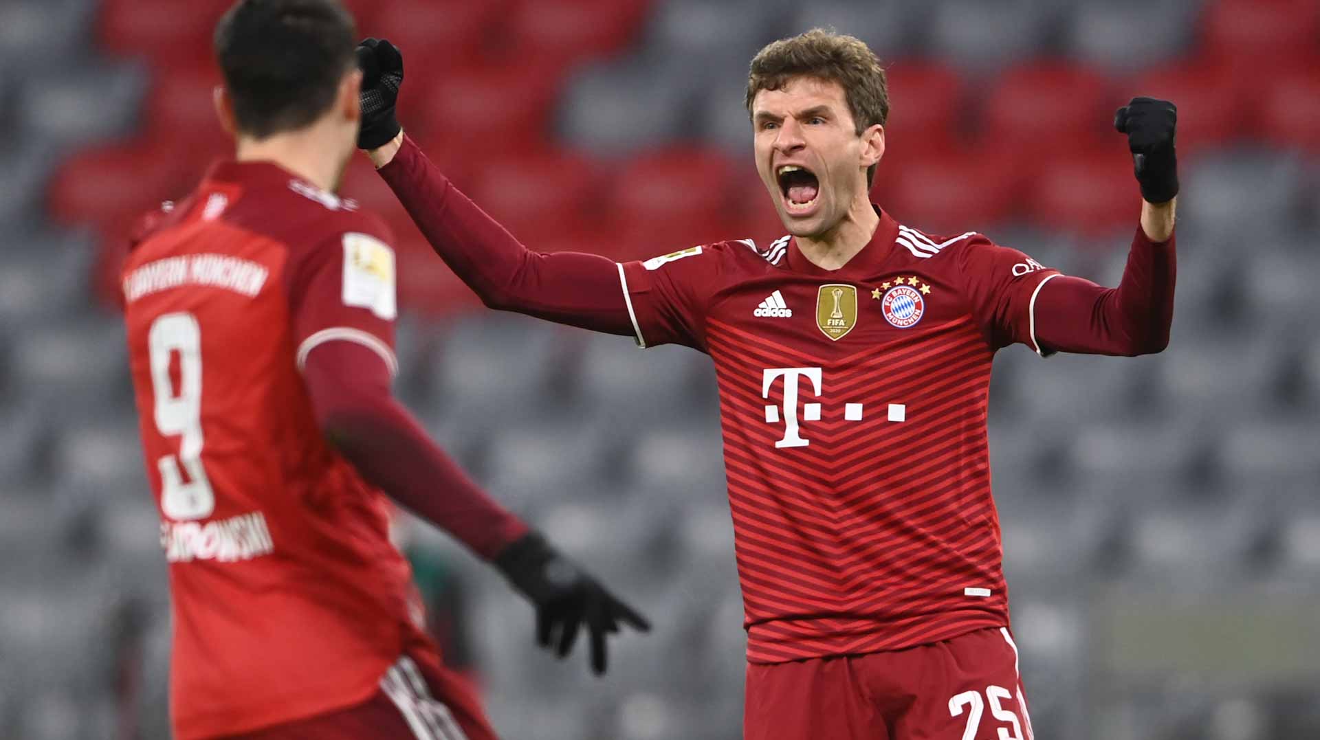 Image for the title: Mueller scores in 400th game as Bayern crush Wolfsburg 