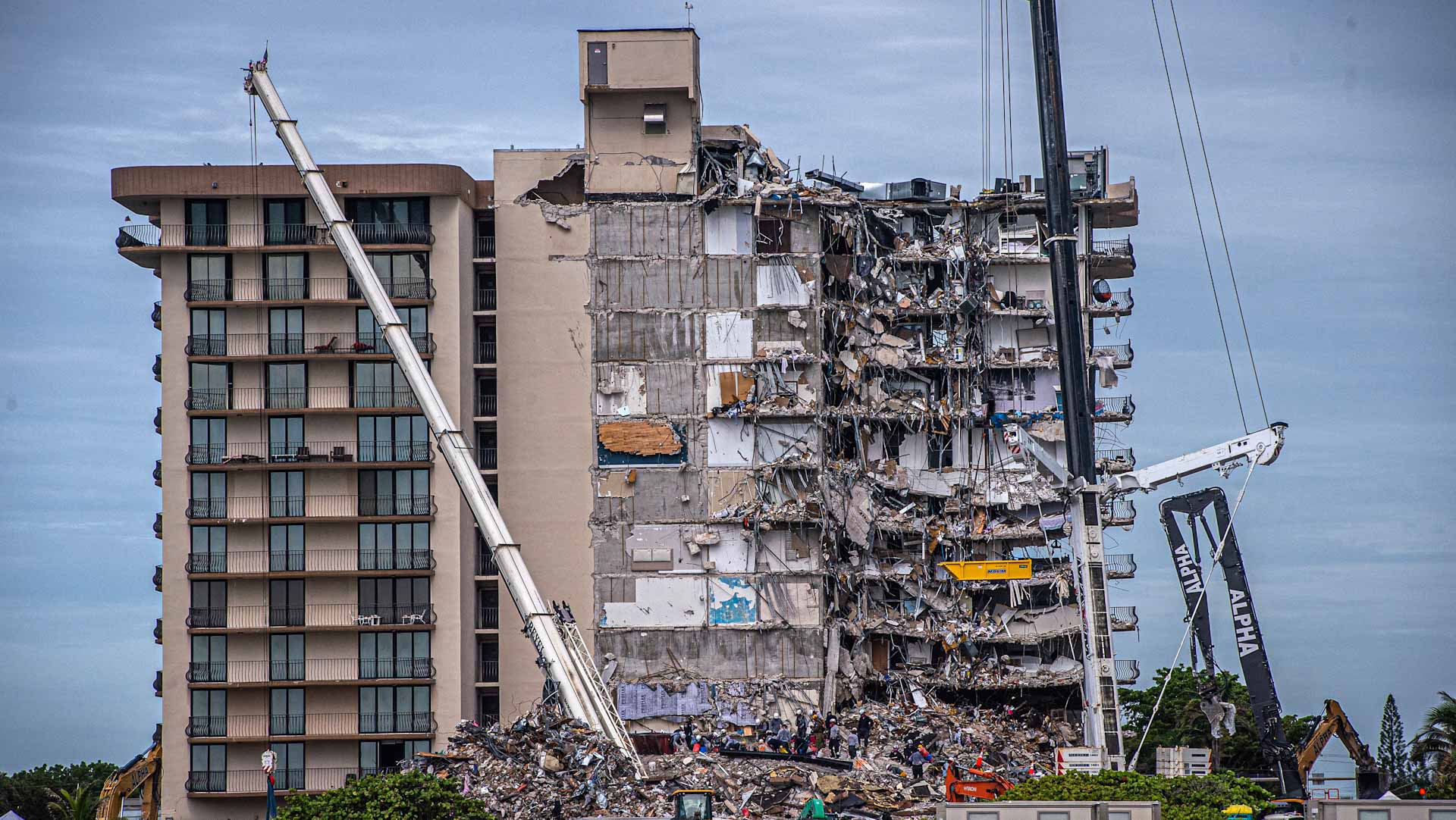 Image for the title: Search resumes for 145 missing in rubble of Florida condo 