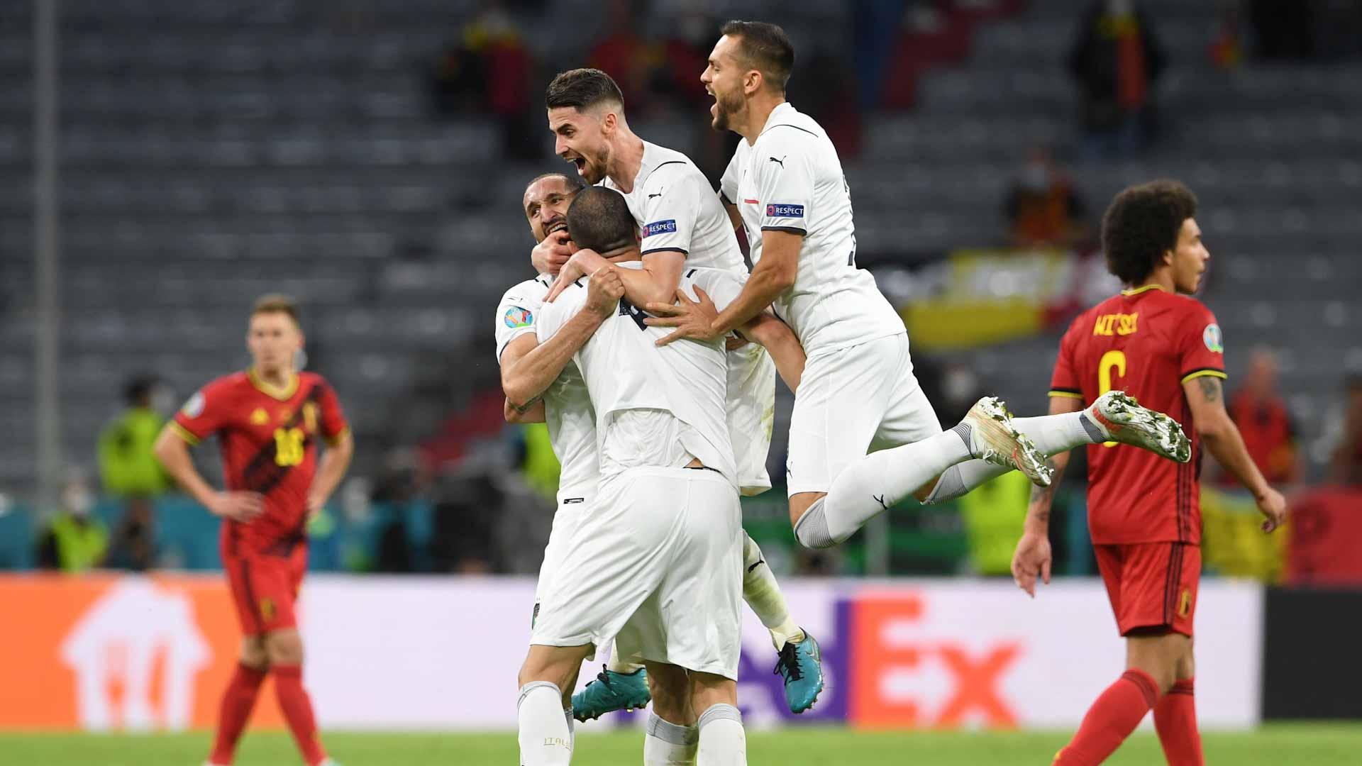 Image for the title: Italy book semi-final spot with 2-1 win over Belgium 