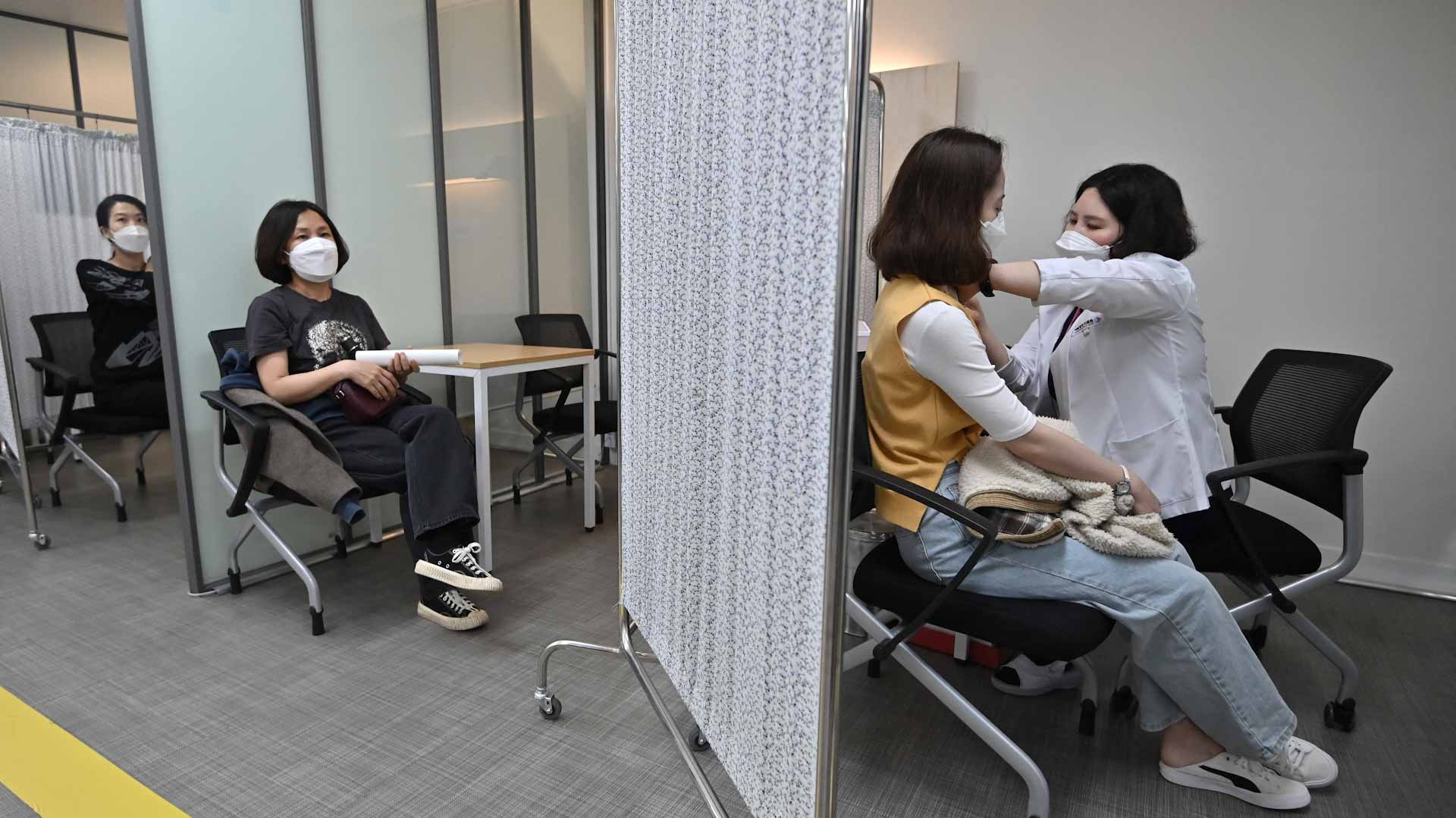 Image for the title: South Korea reports highest daily COVID-19 caseload in months 