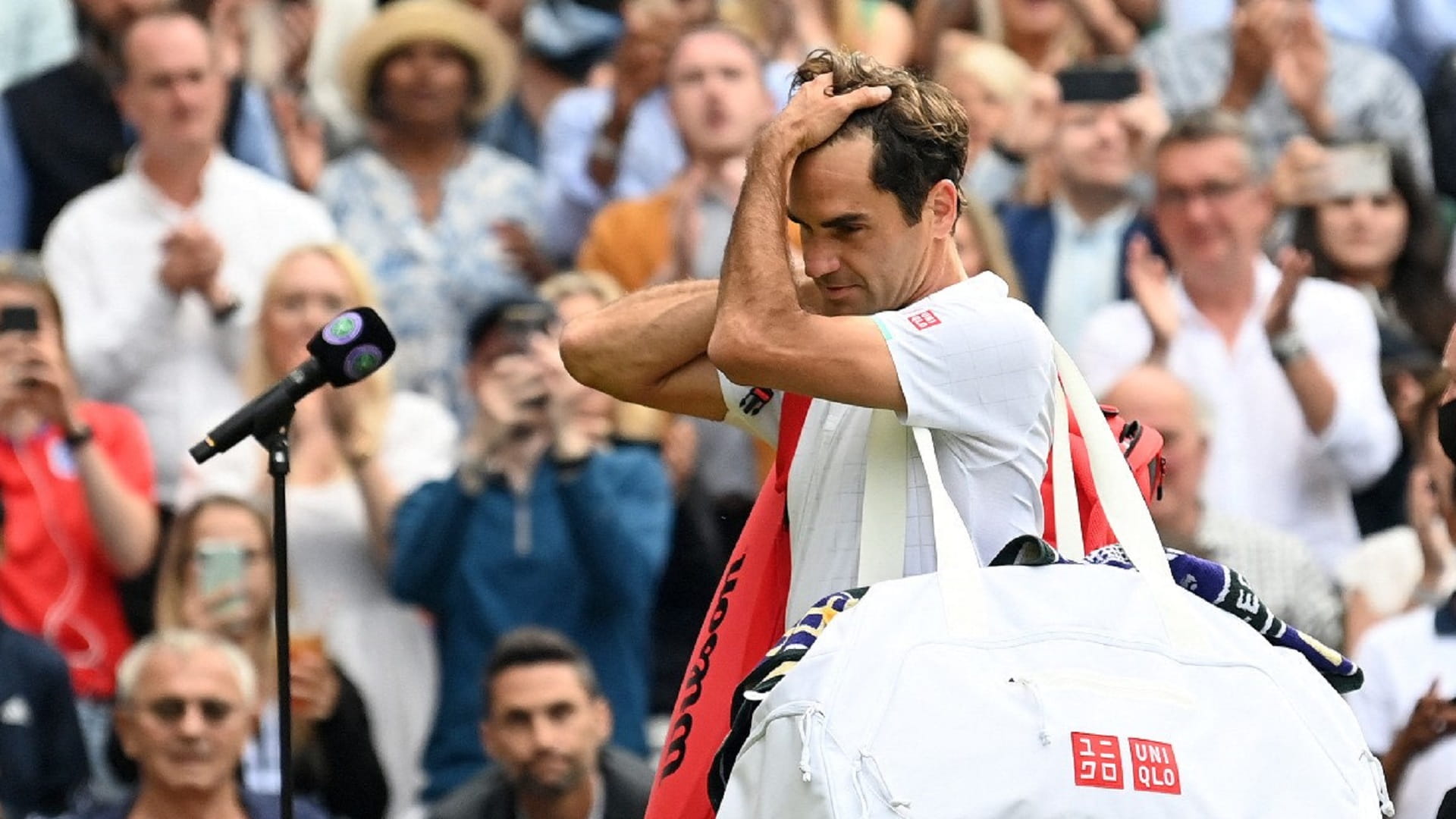 صورة بعنوان: انسحاب النجم السويسري فيدرر من أولمبياد طوكيو 