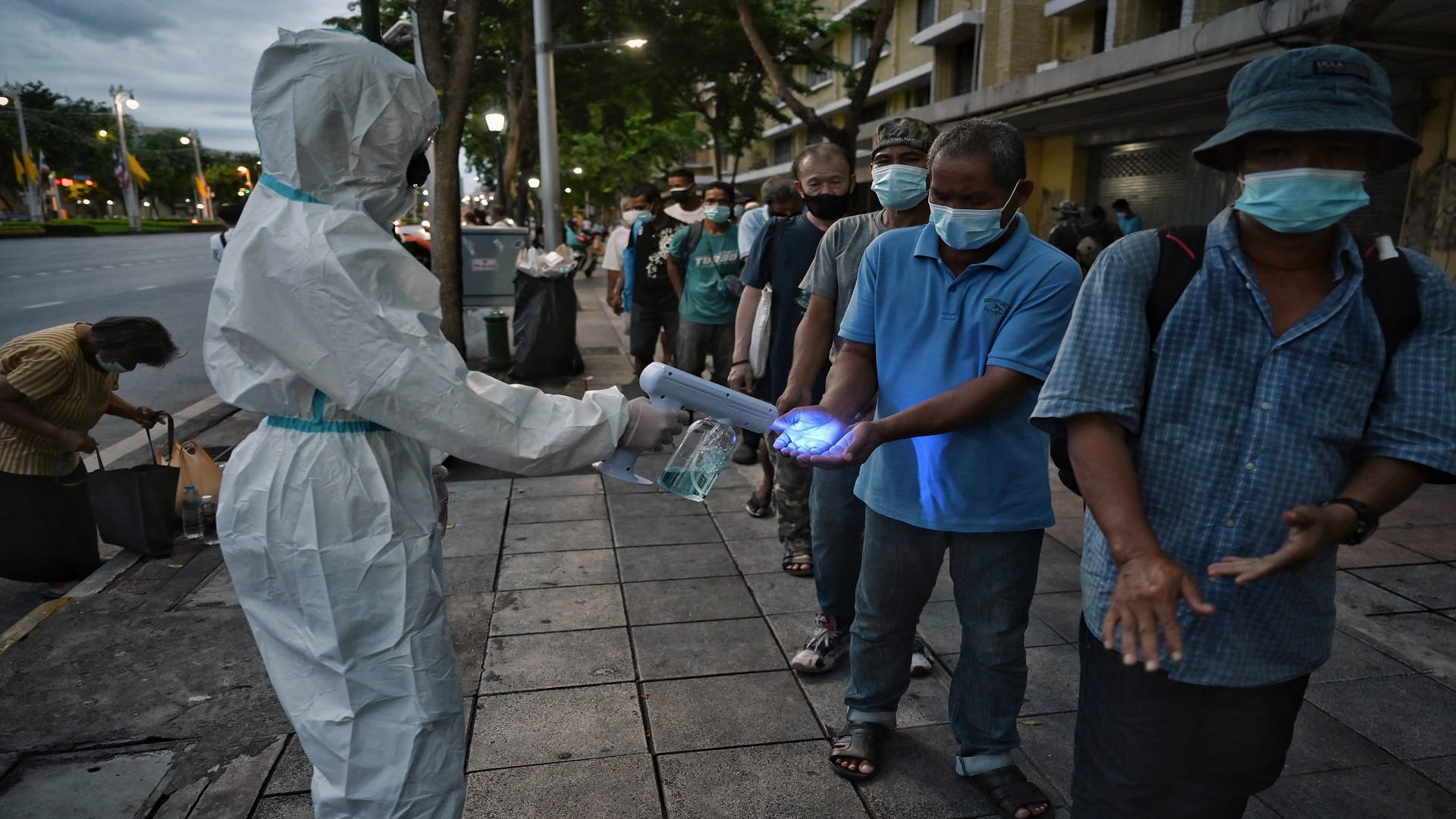 Image for the title: Thailand reports record number of COVID-19 cases for fourth day 