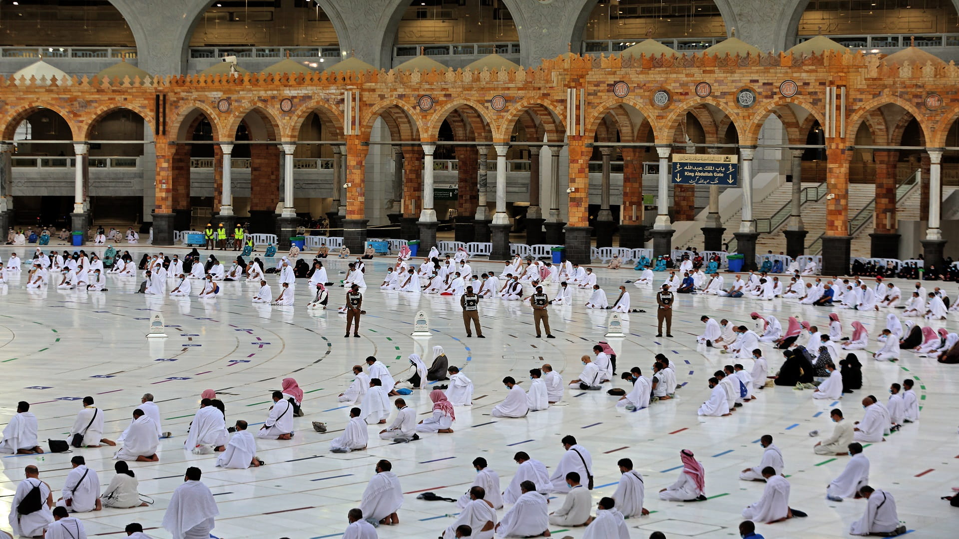 Image for the title: Muslims perform Eid Al Adha prayer in the Grand Holy Mosque, KSA 