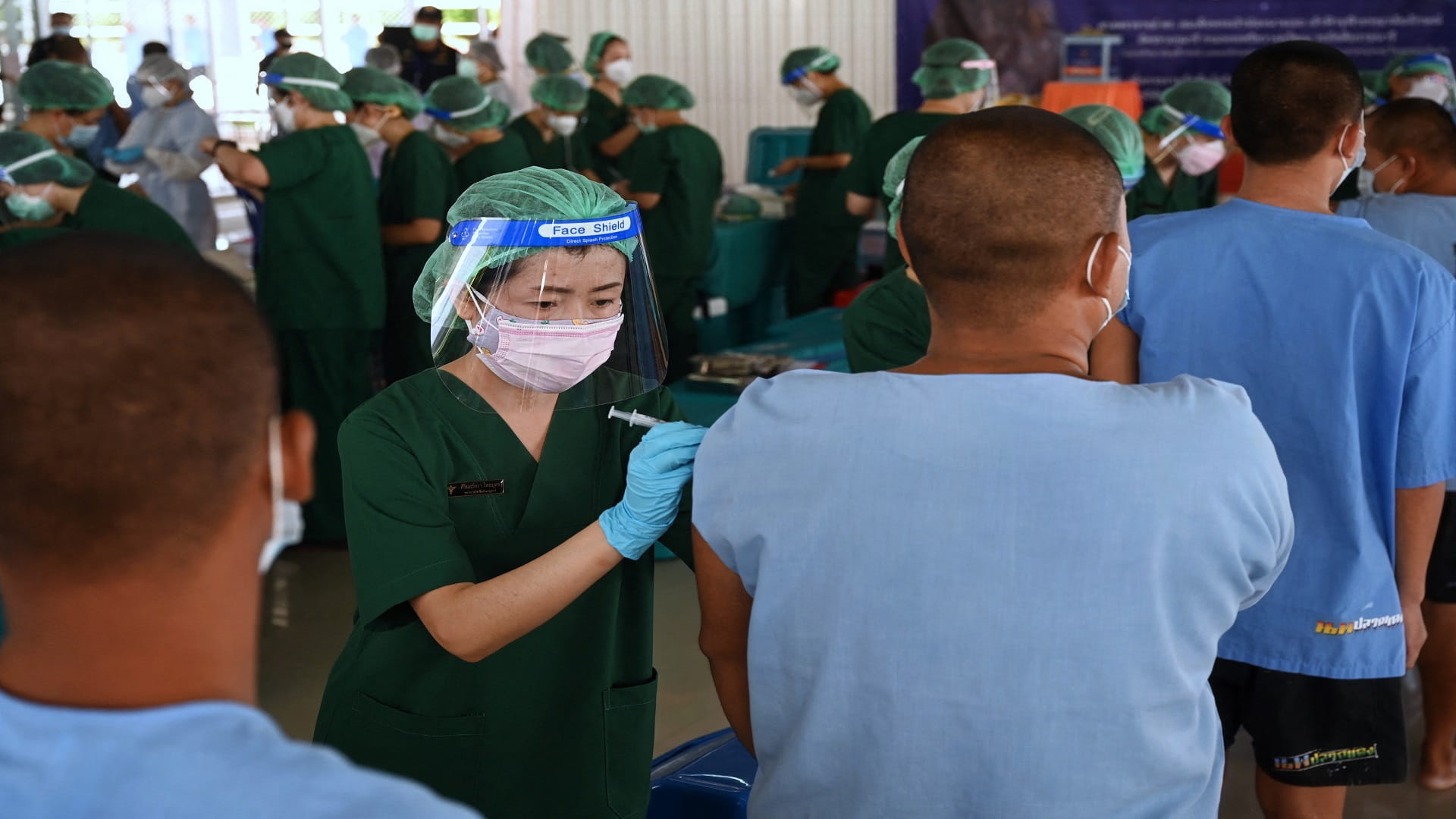 Image for the title: Thailand reports daily record of 13,655 coronavirus cases 