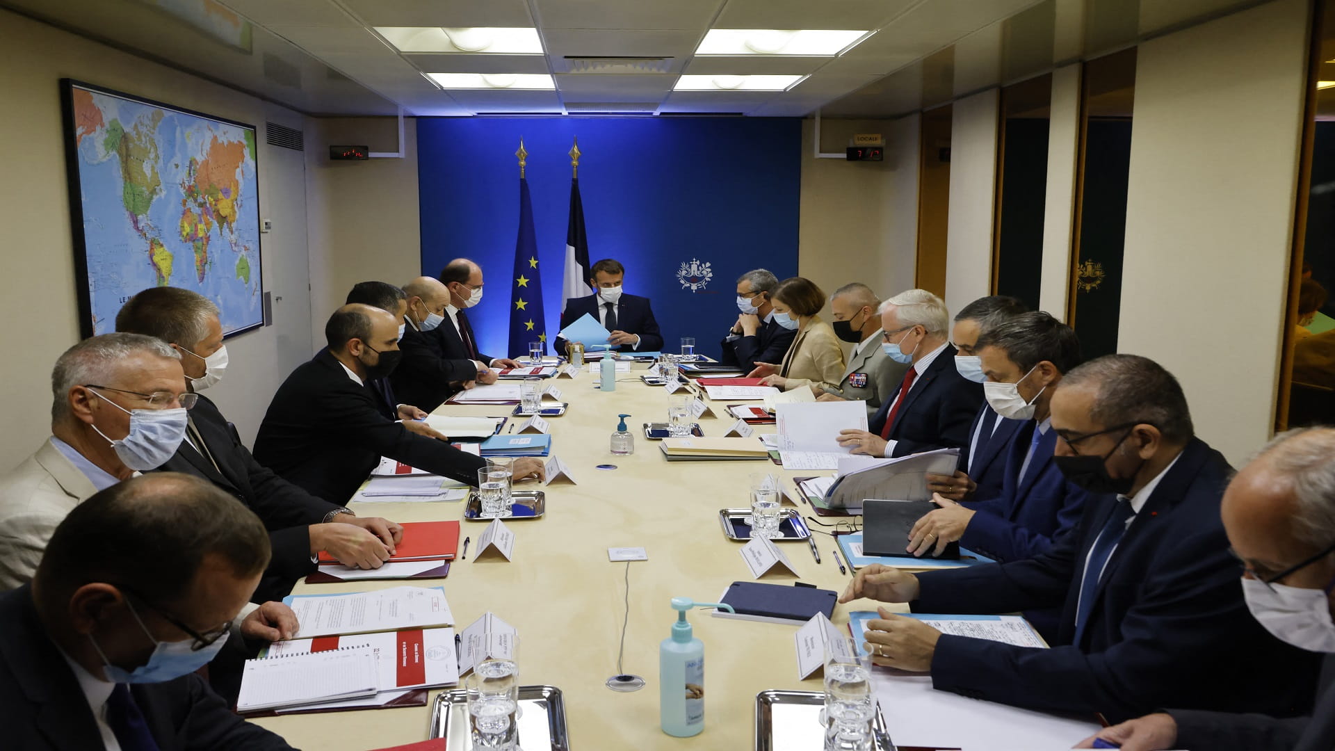 Image for the title: Macron calls national security meeting to discuss Pegasus spyware 