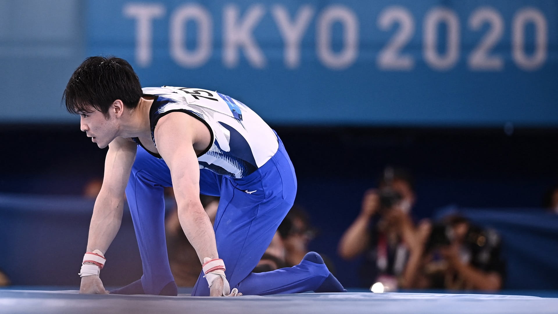 Image for the title: Japan's Uchimura out of Olympics after horizontal bars flop 